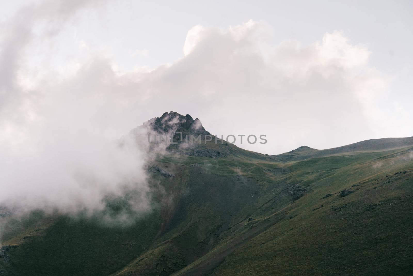 Cloudscape over summer mountain, nature background.