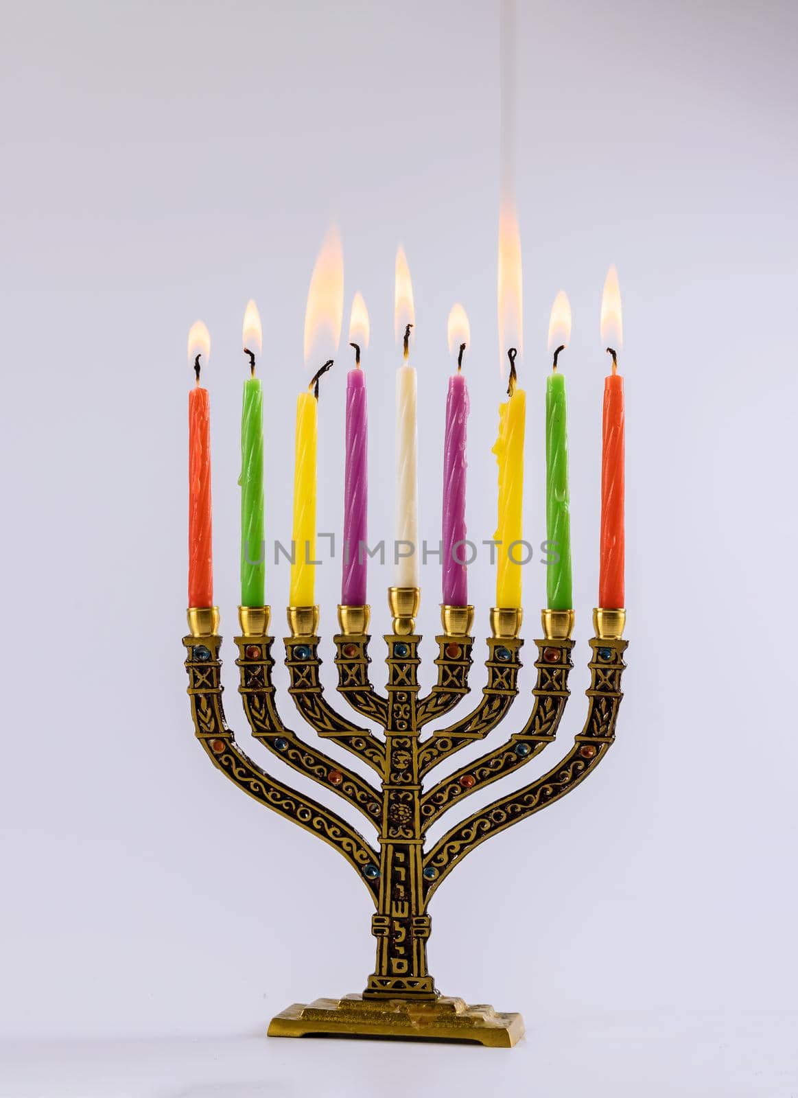 Jewish holiday hanukkah symbols menorah with copy space white background by ungvar