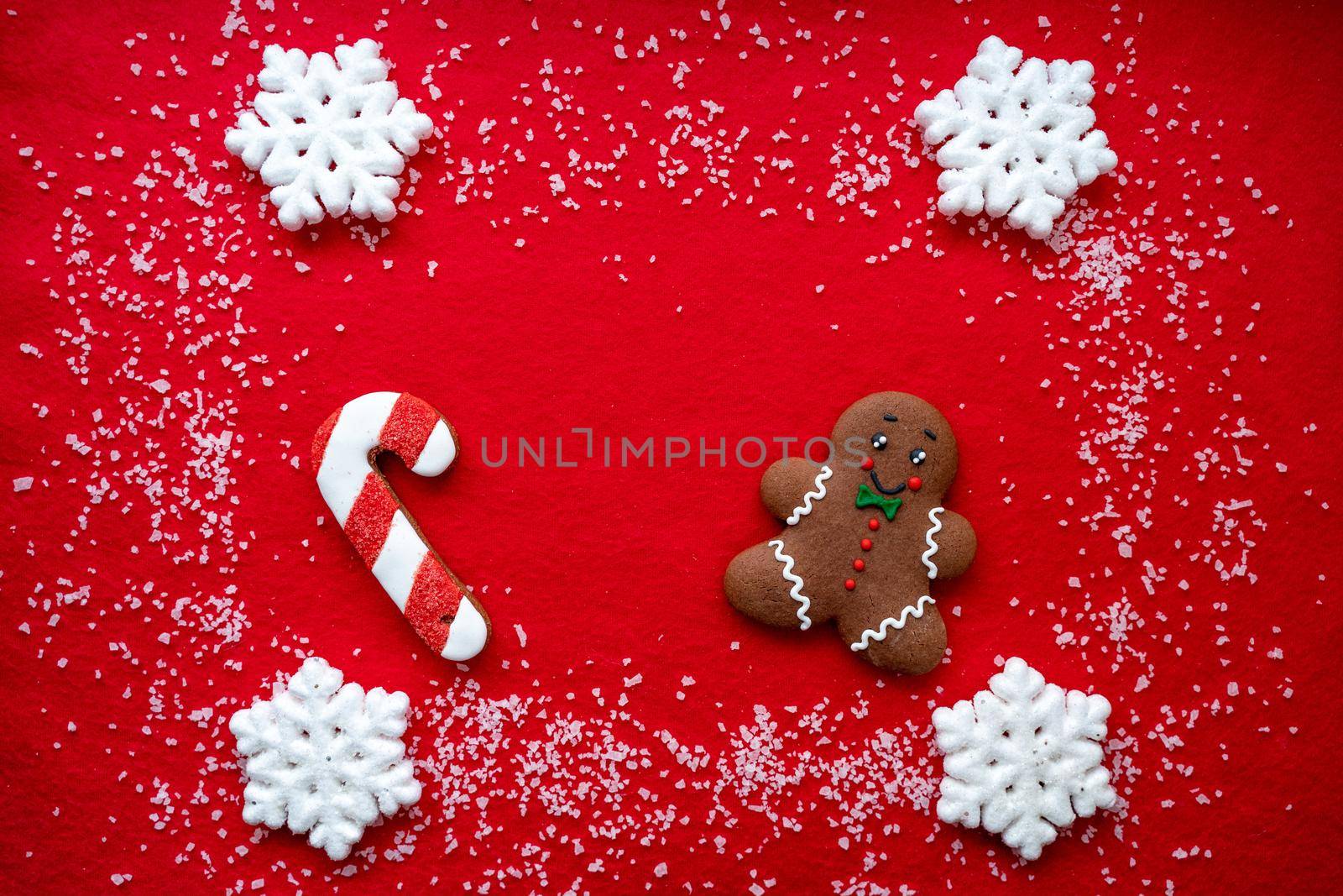 Christmas decorations layout or flatlay with fir branches and cones on red background.Eco natural frame. winter, new year Holidays concept as top view, copyspace. greeting card template by Matiunina