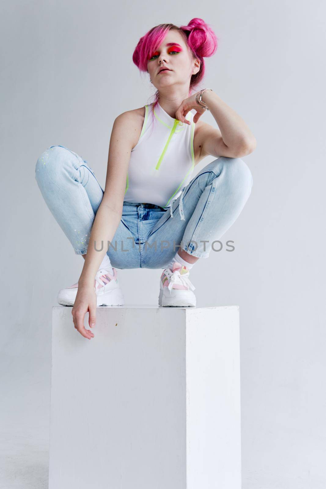 woman with pink hair teen fashionable clothes posing neon. High quality photo