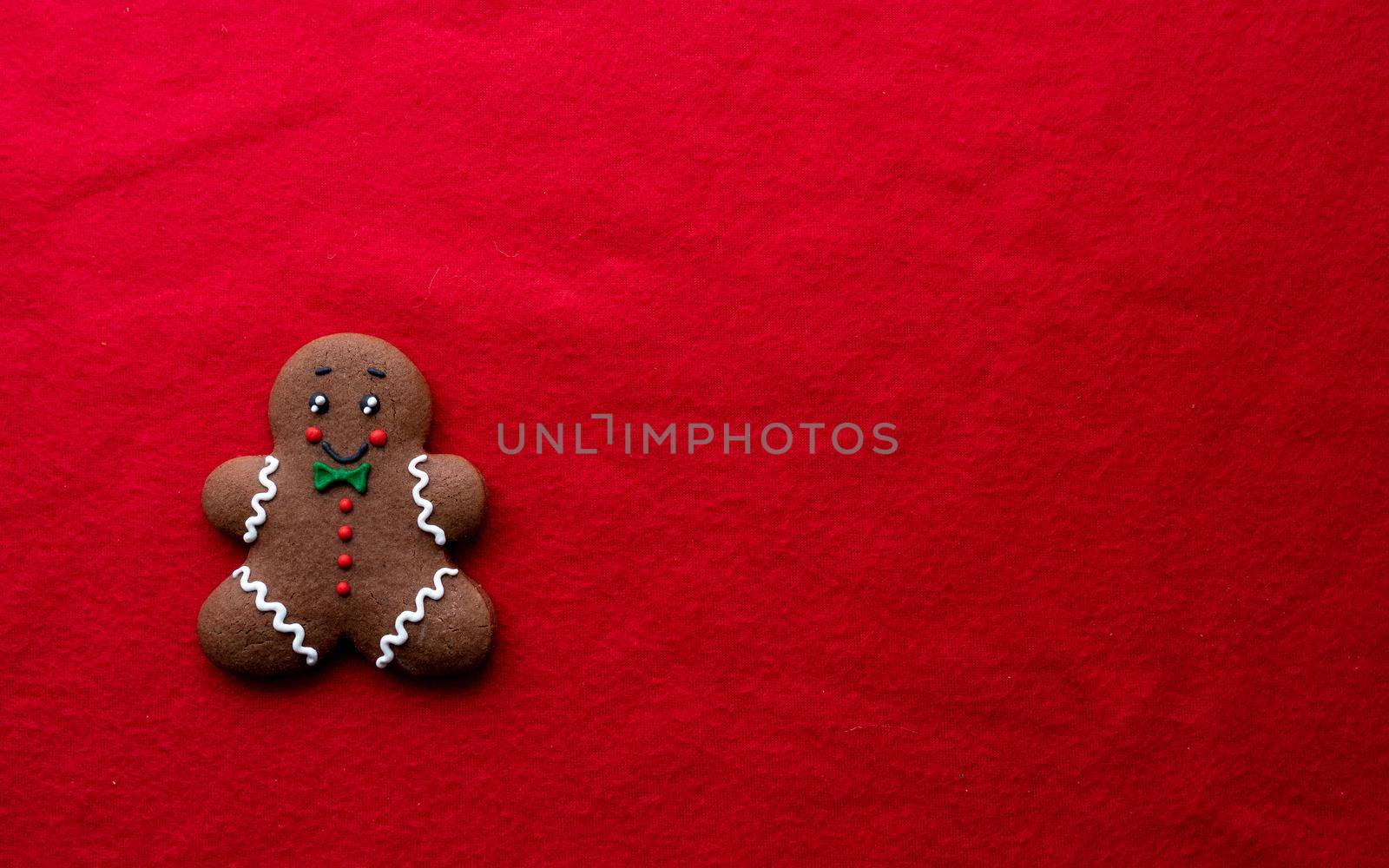 Christmas decoration mock up or flatlay with gingerbread man on red background. Eco natural frame. winter, New Year Holidays concept as top view, copyspace. greeting card template by Matiunina