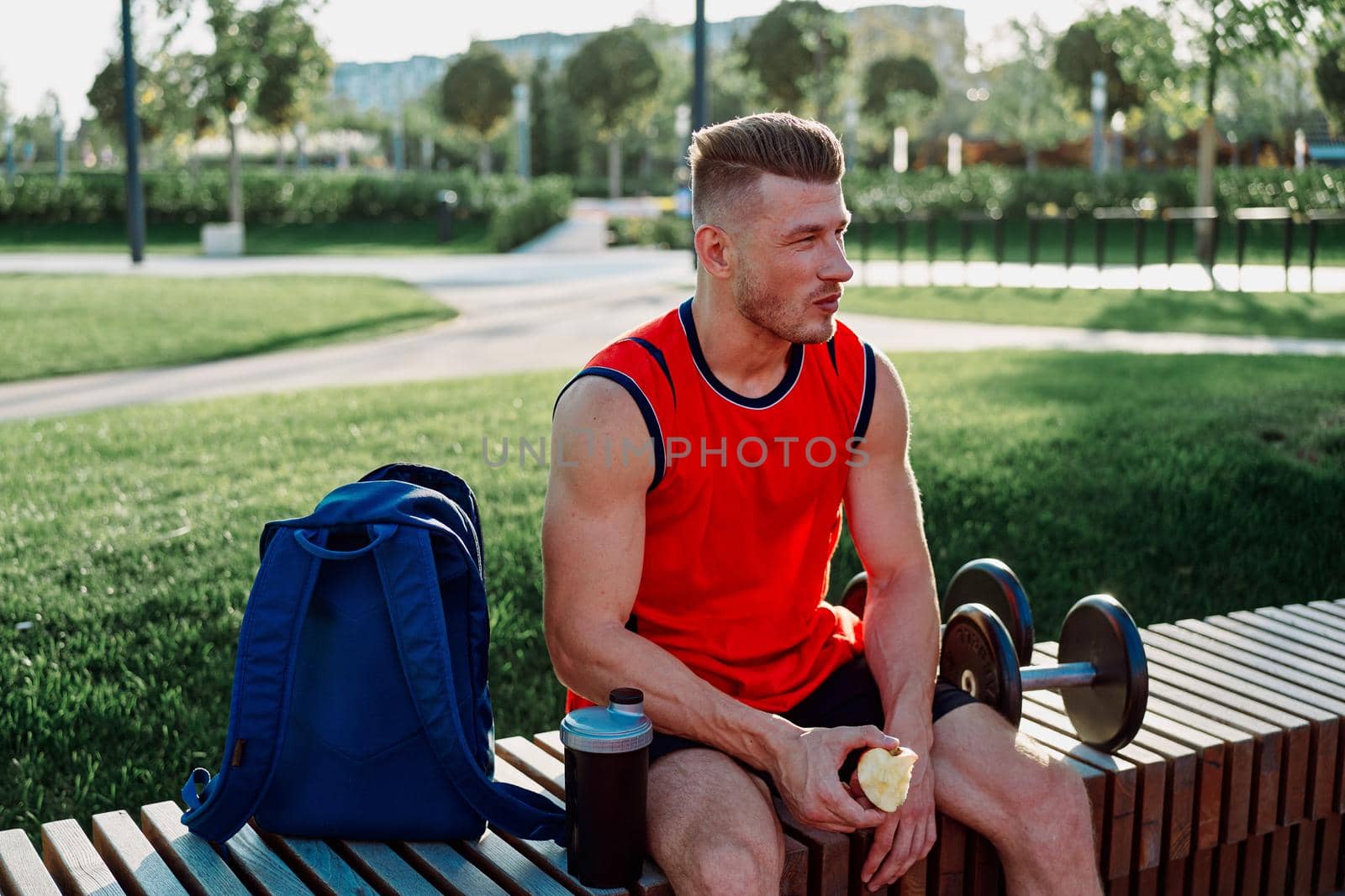 sporty man sitting on bench fitness workout lifestyle by Vichizh