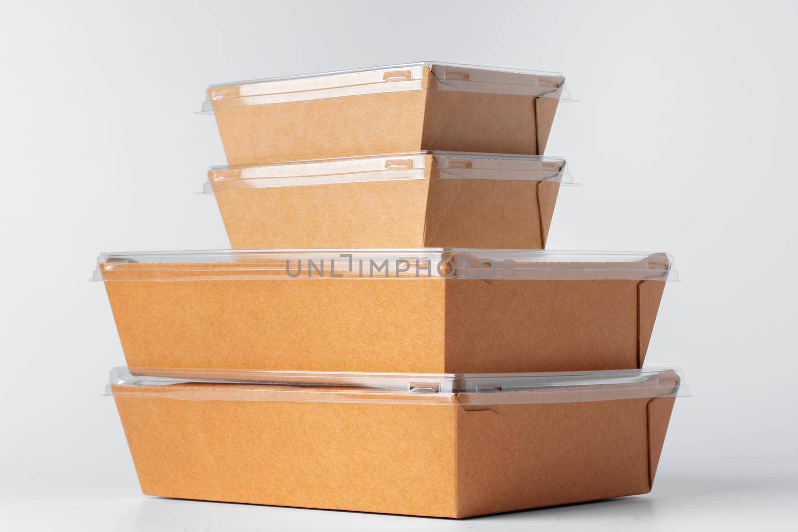 Cardboard brown food box pack isolated on white background close up