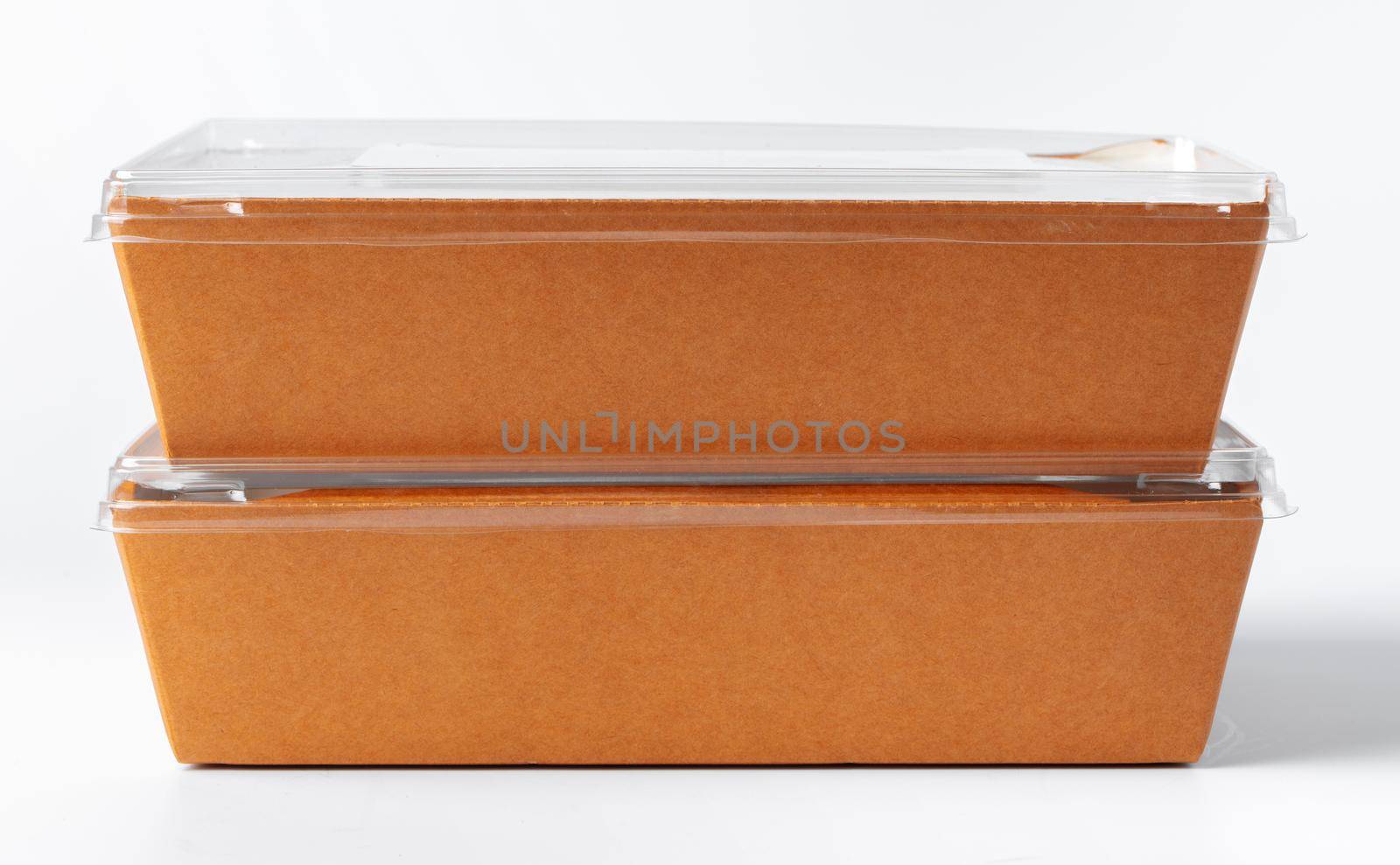 Cardboard brown food box pack isolated on white background close up