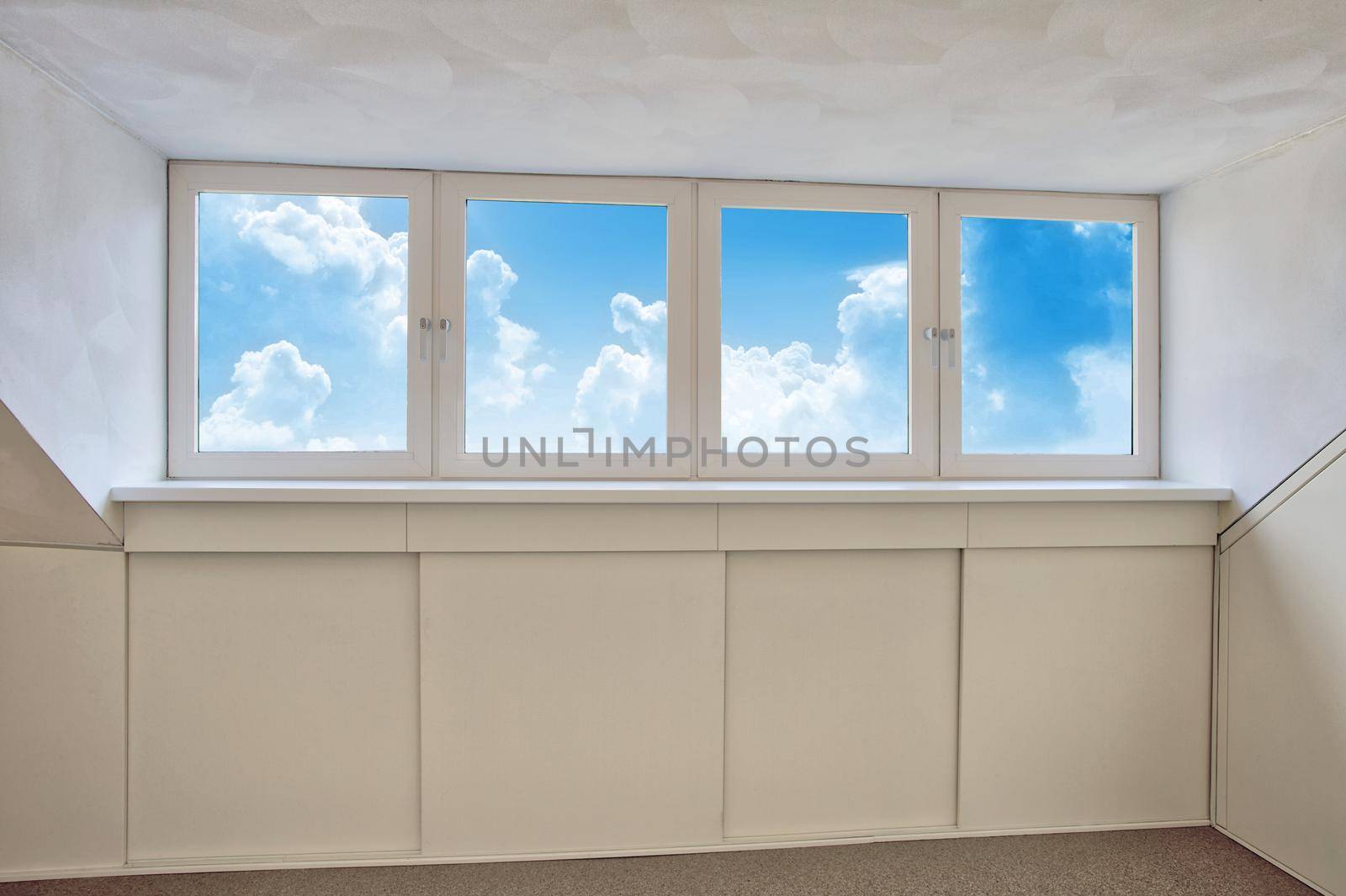 Fresh white modern dormer window with blue sky and white clouds view, New dormer, roof window in empty new house closeup