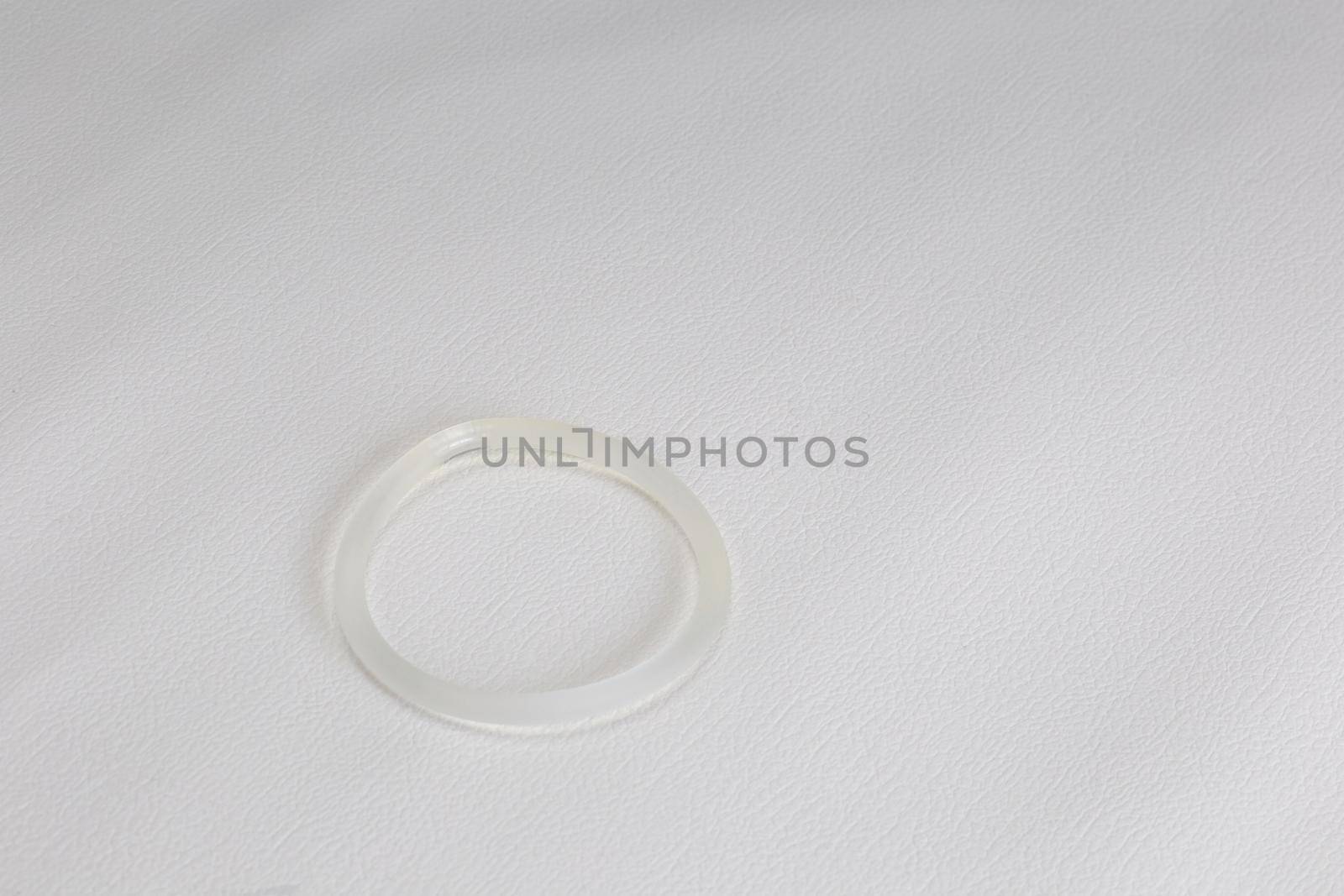 Band Birth Control, hormone, contraception for woman on white background, Vaginal ring with copy space closeup