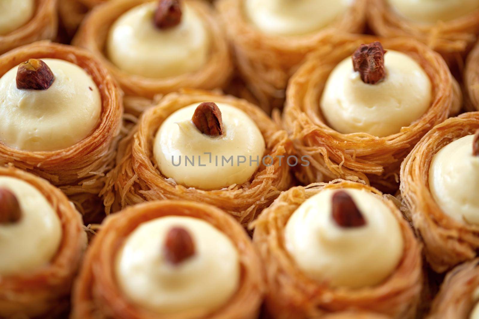 Turkish baklava dessert with honey, close up photo