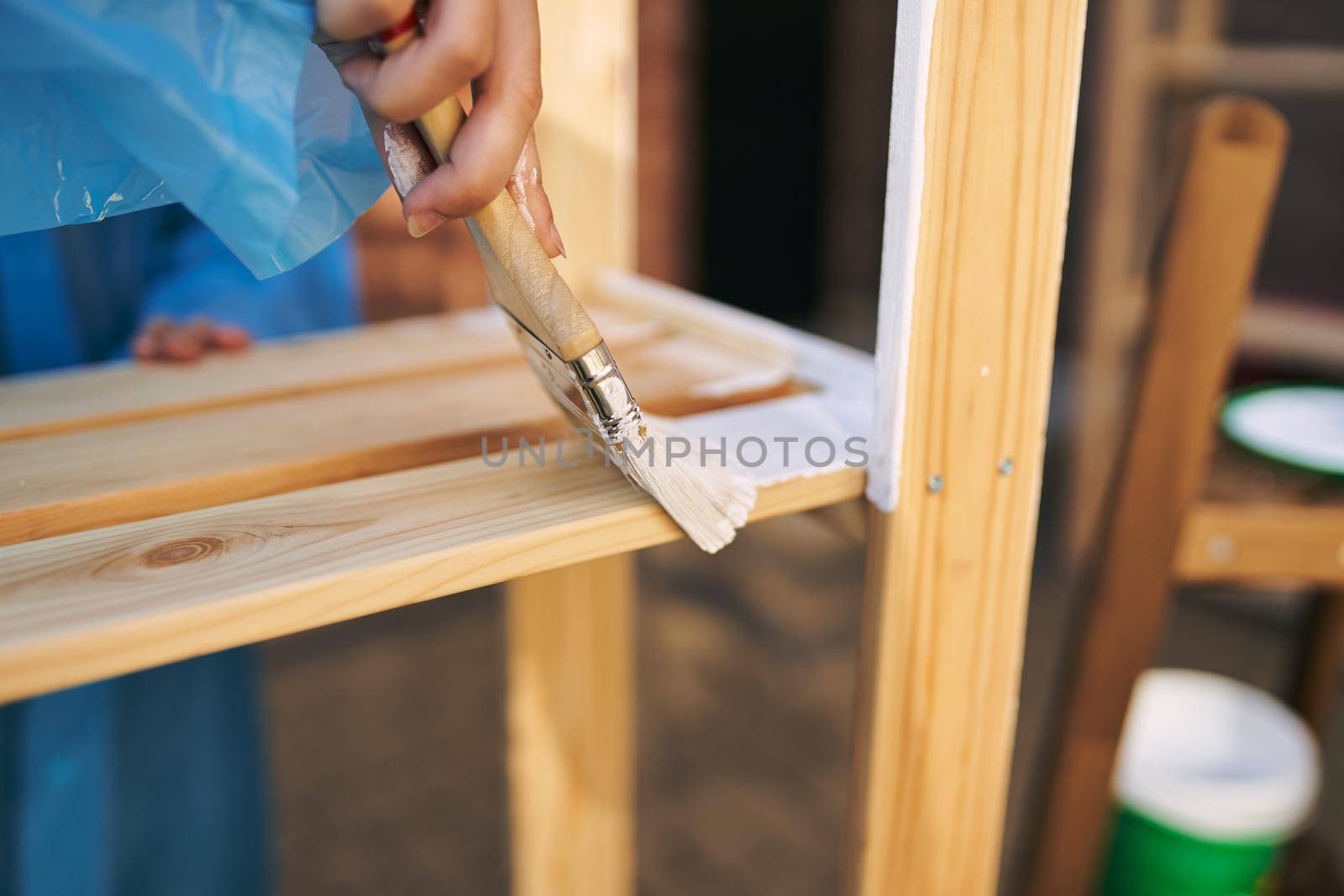 women paint wooden structures brush painter decoration by Vichizh