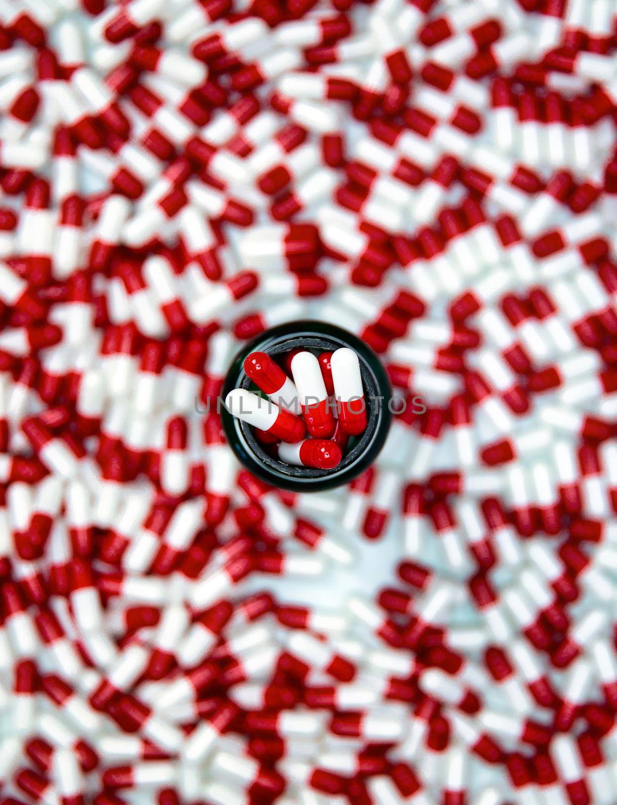 Capsule pills medication,Vitamin,antibiotic pharmaceutical background top view, colorful white and red,Business,Health,industrial concept tablets