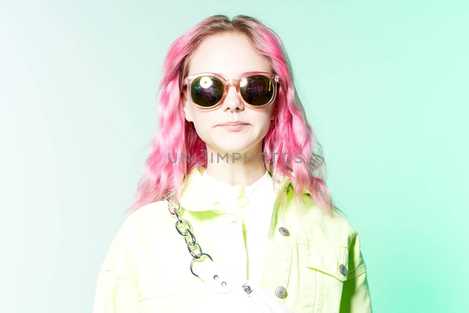 cheerful woman with bright makeup pink hair Glamor posing fun. High quality photo