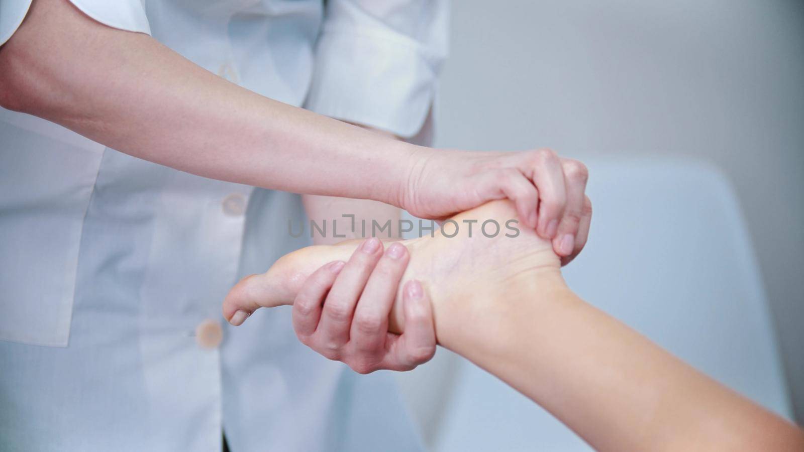 Massage - massage master is kneading womans feet by Studia72