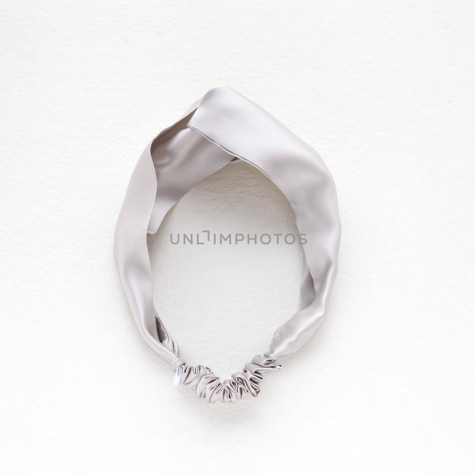 silk silver hairband isolated on white. Flat lay Hairdressing tools and accessories as Hair Scrunchie, Elastic Hair Bands, Bobble Scrunchie Hairband square image