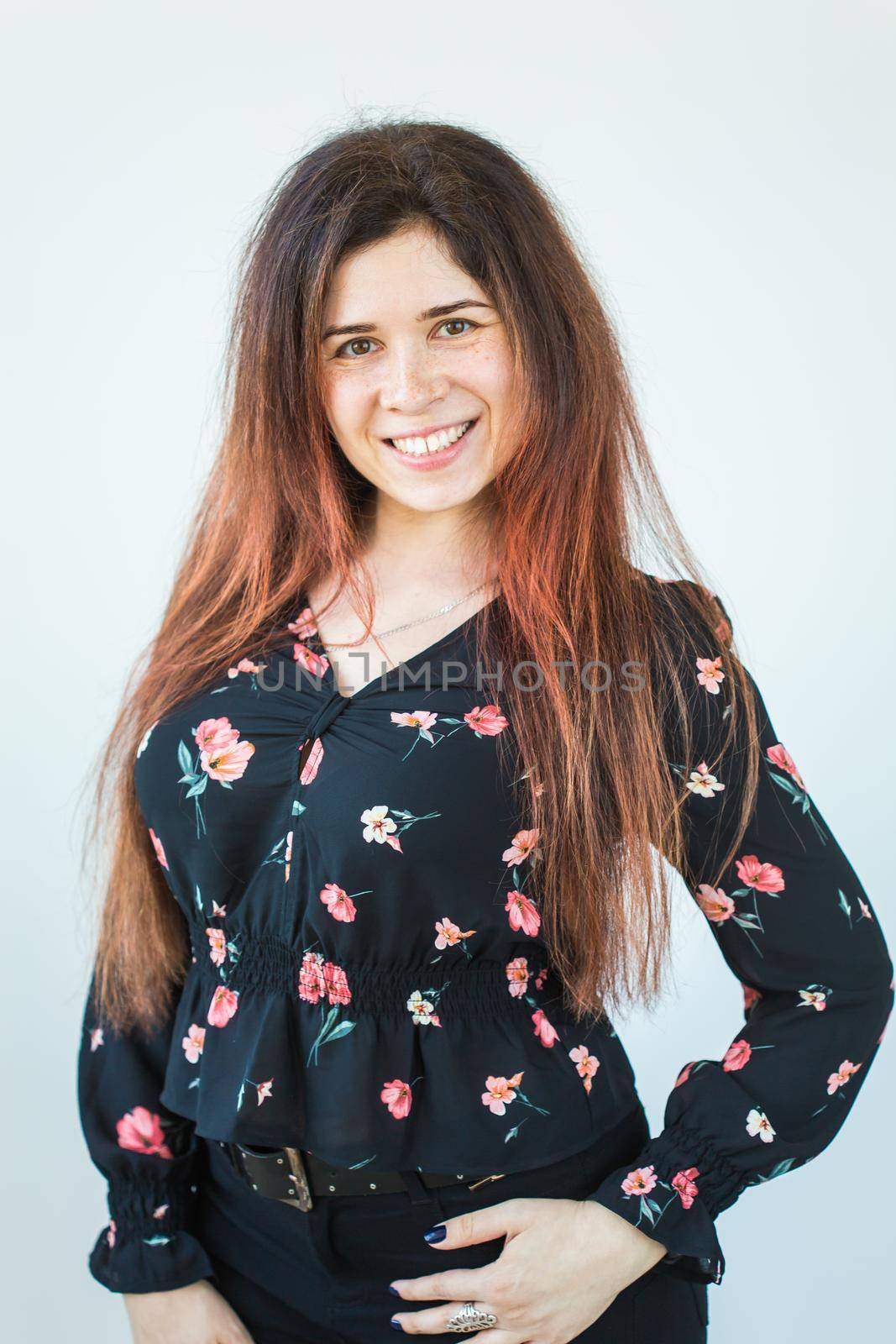 Close up portrait of funny attractive pretty girl with long ginger fair hair standing on white background. by Satura86