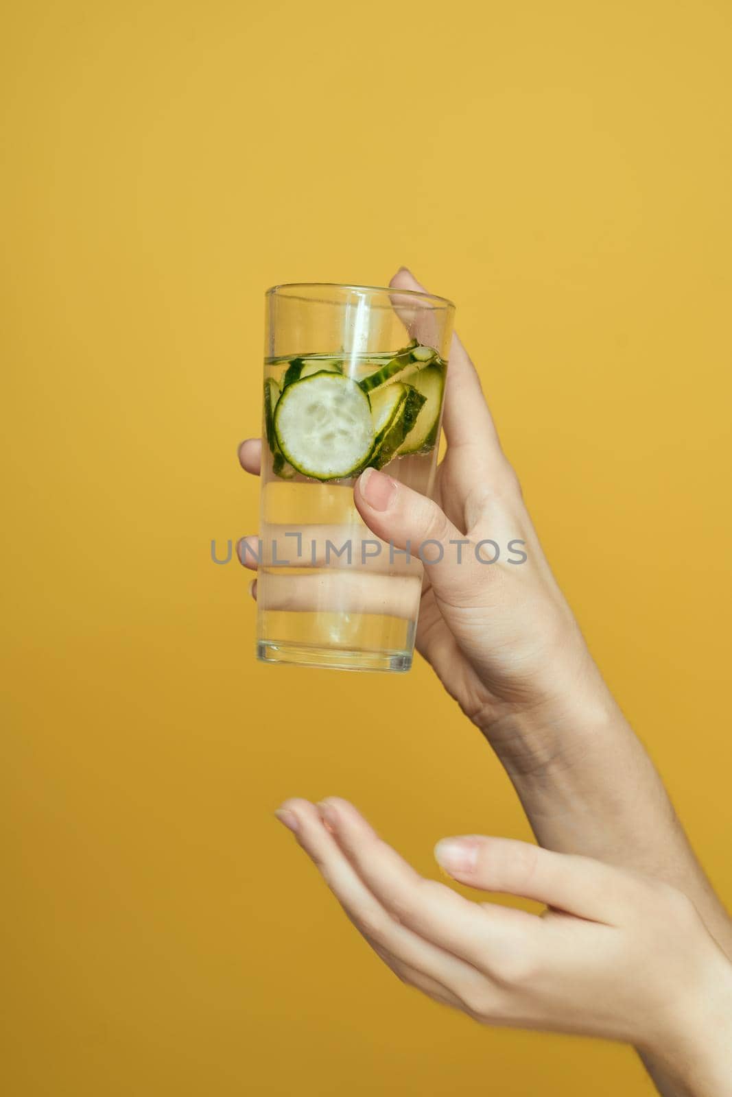 cucumber Fresh vitamins detoxification yellow background cosmetology by Vichizh