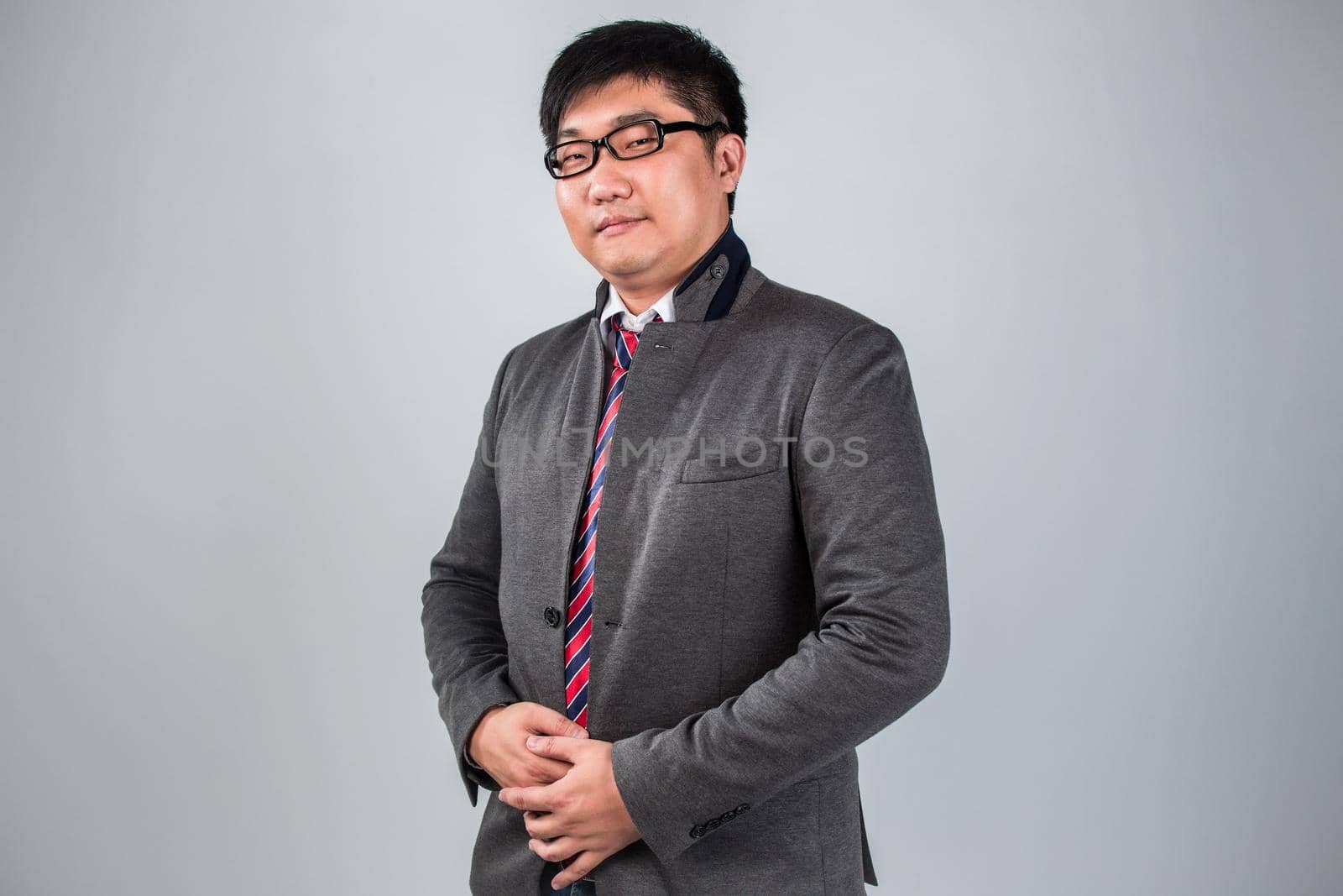 Man in suit wearing a glasses good