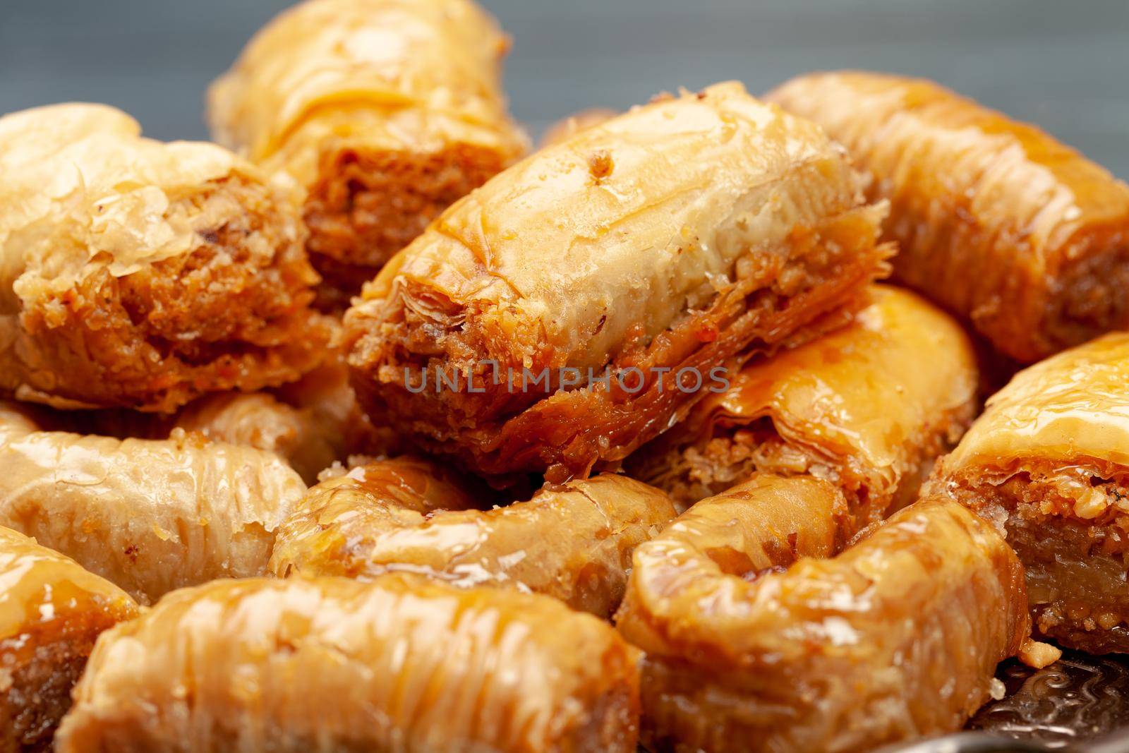 Plate of baklava dessert served on table