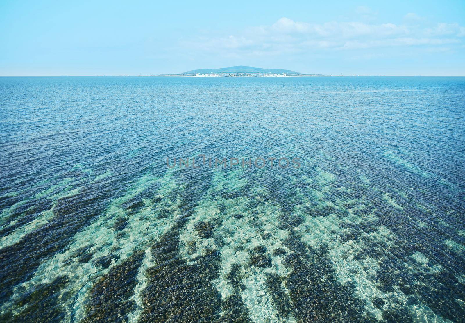 Beautiful green island in the blue ocean