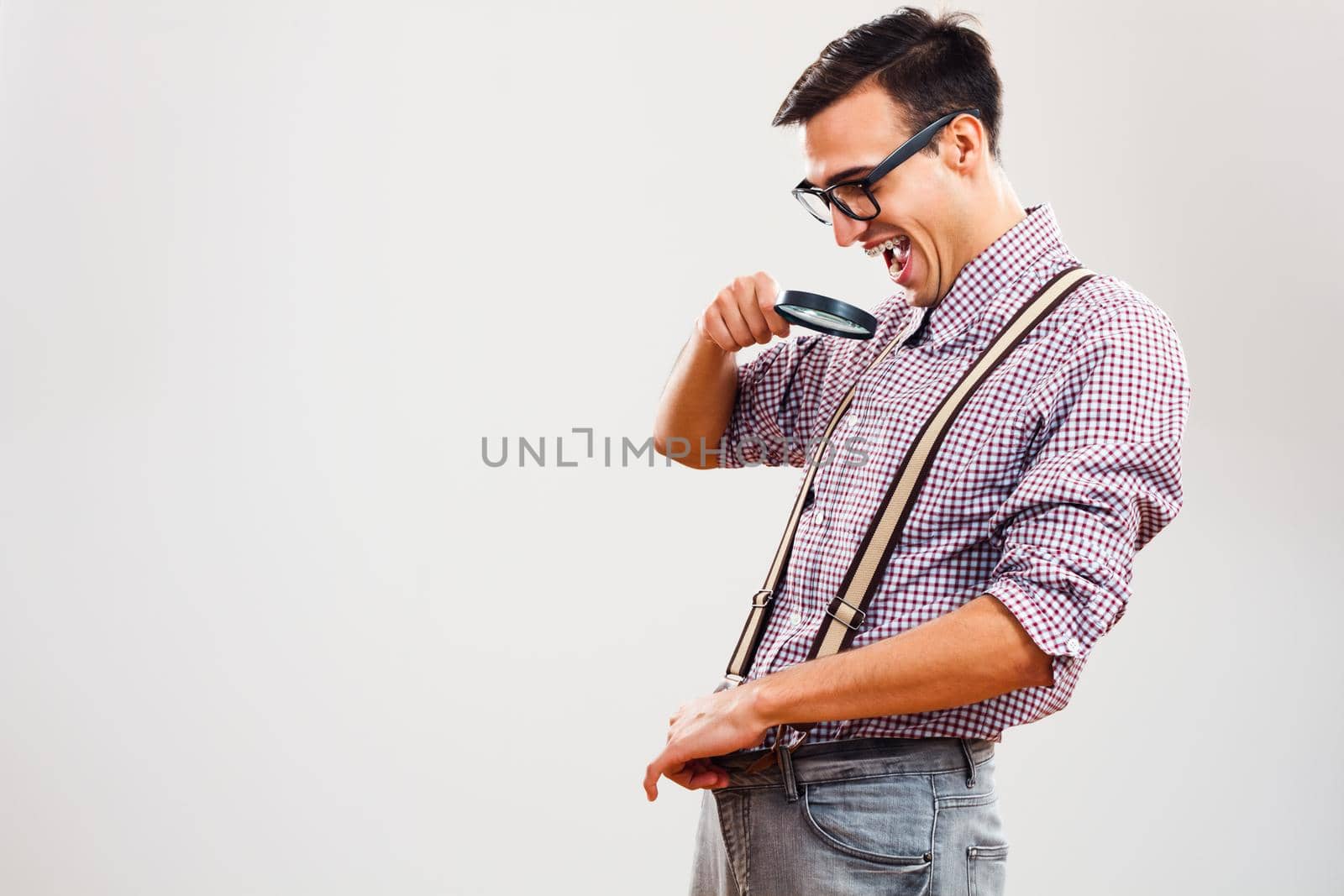 Nerdy man looking in his pants magnifying glass by Bazdar