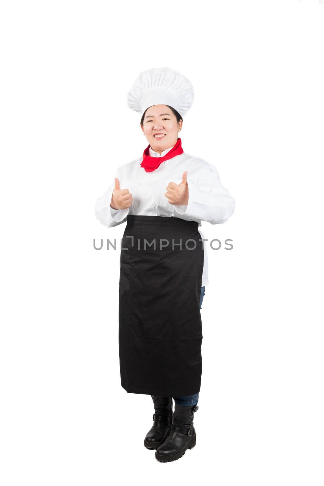 smiling female chef, cook or baker showing thumbs up by whatwolf