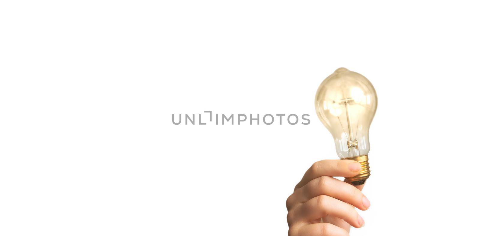 Hand holding glowing light bulb,finding innovative solutions and creative ideas, being unique, thinking different concept isolated on white background, copy space by Annebel146