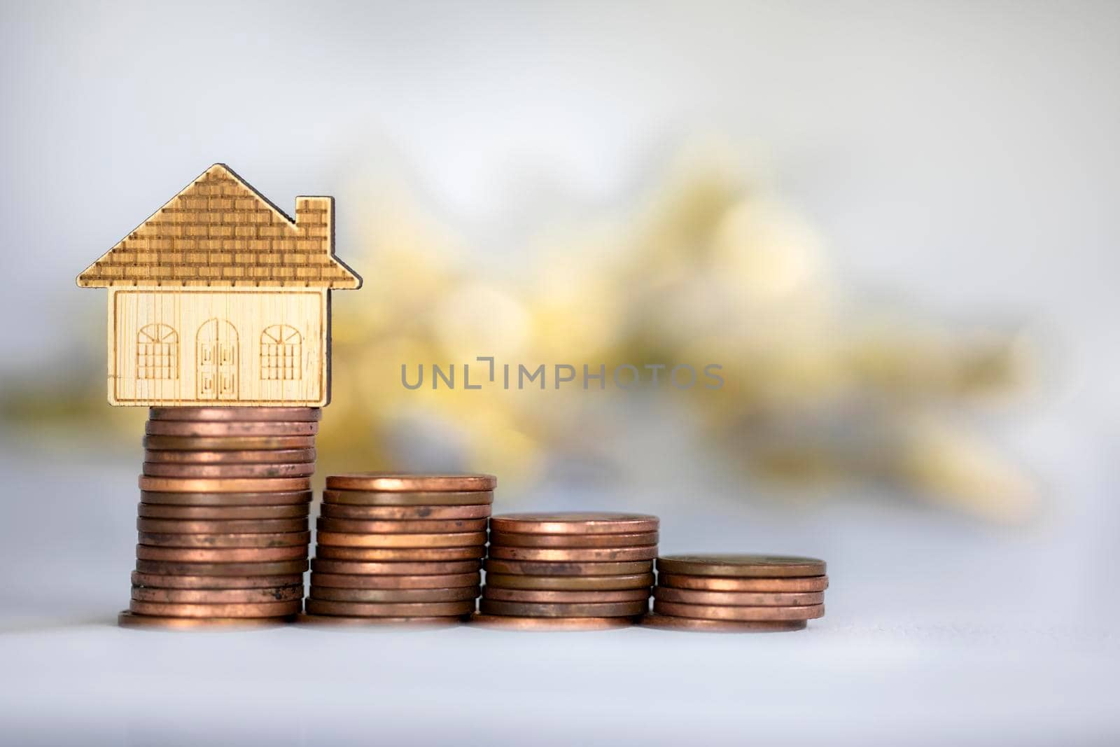 coins saving setting stairs up to house model for concept investment mortgage loan finance and business climbing stairs