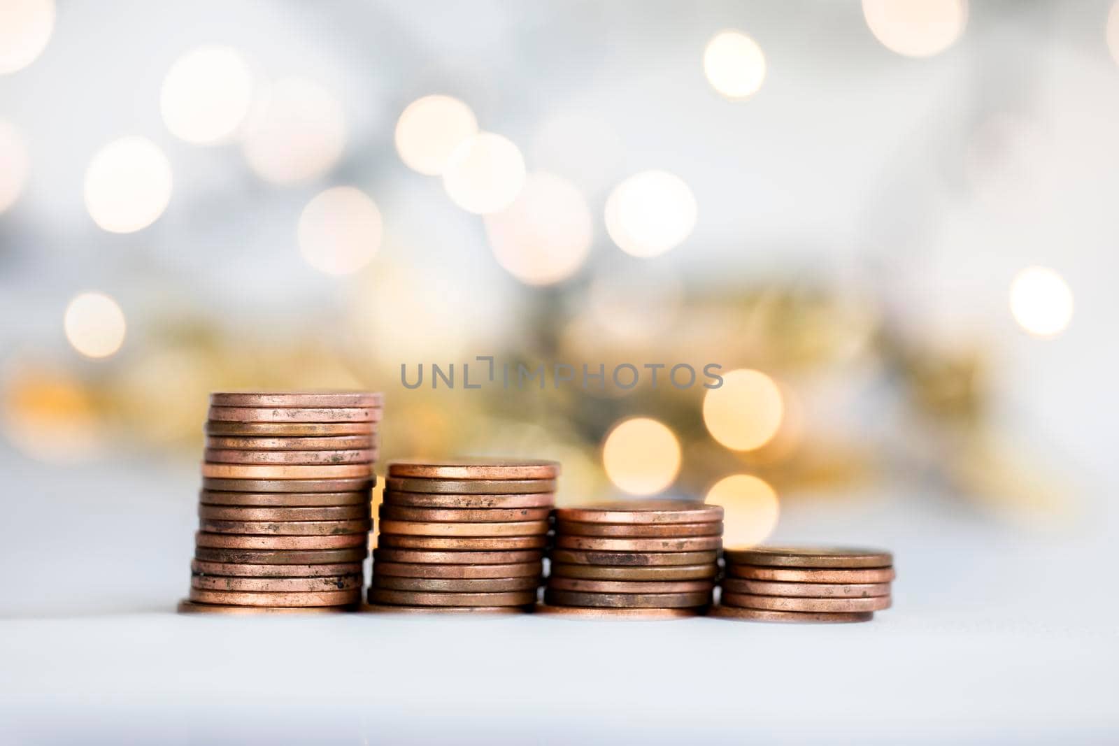 Stack of coins, money climbing stairs with bokeh background, Finance and saving concept with copy space growing business