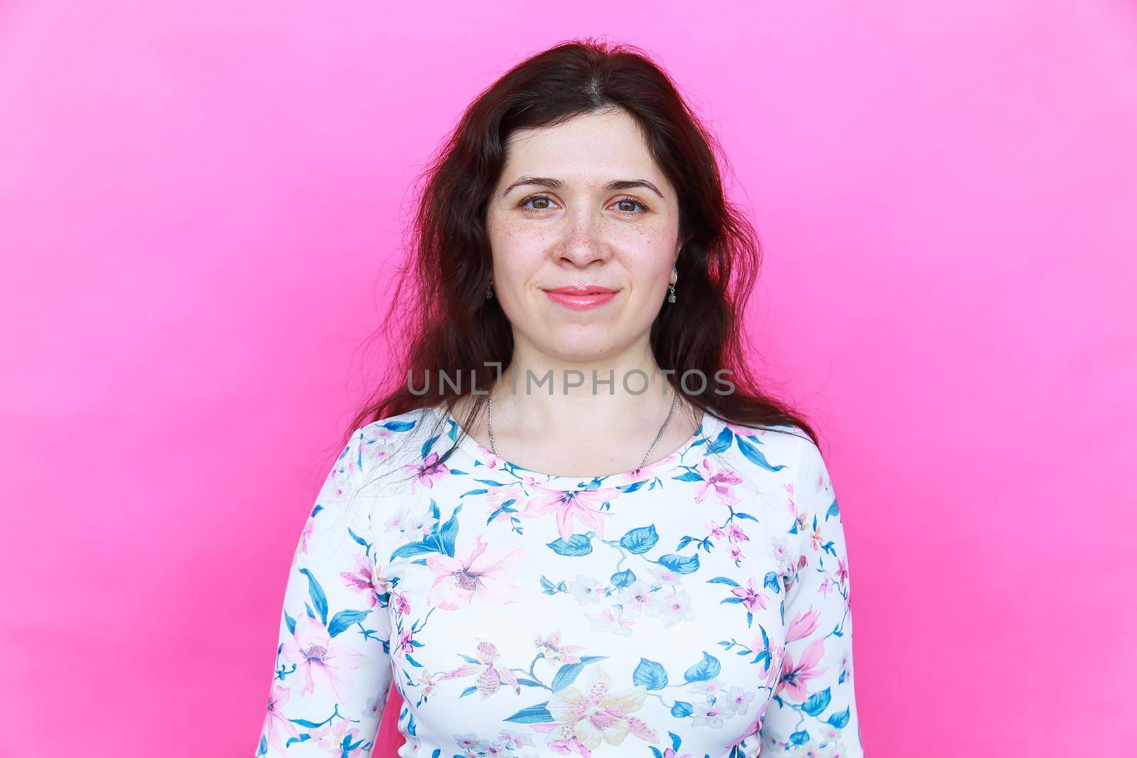 Portrait of bright beautiful girl with art colorful freckles make-up. Body positivity.