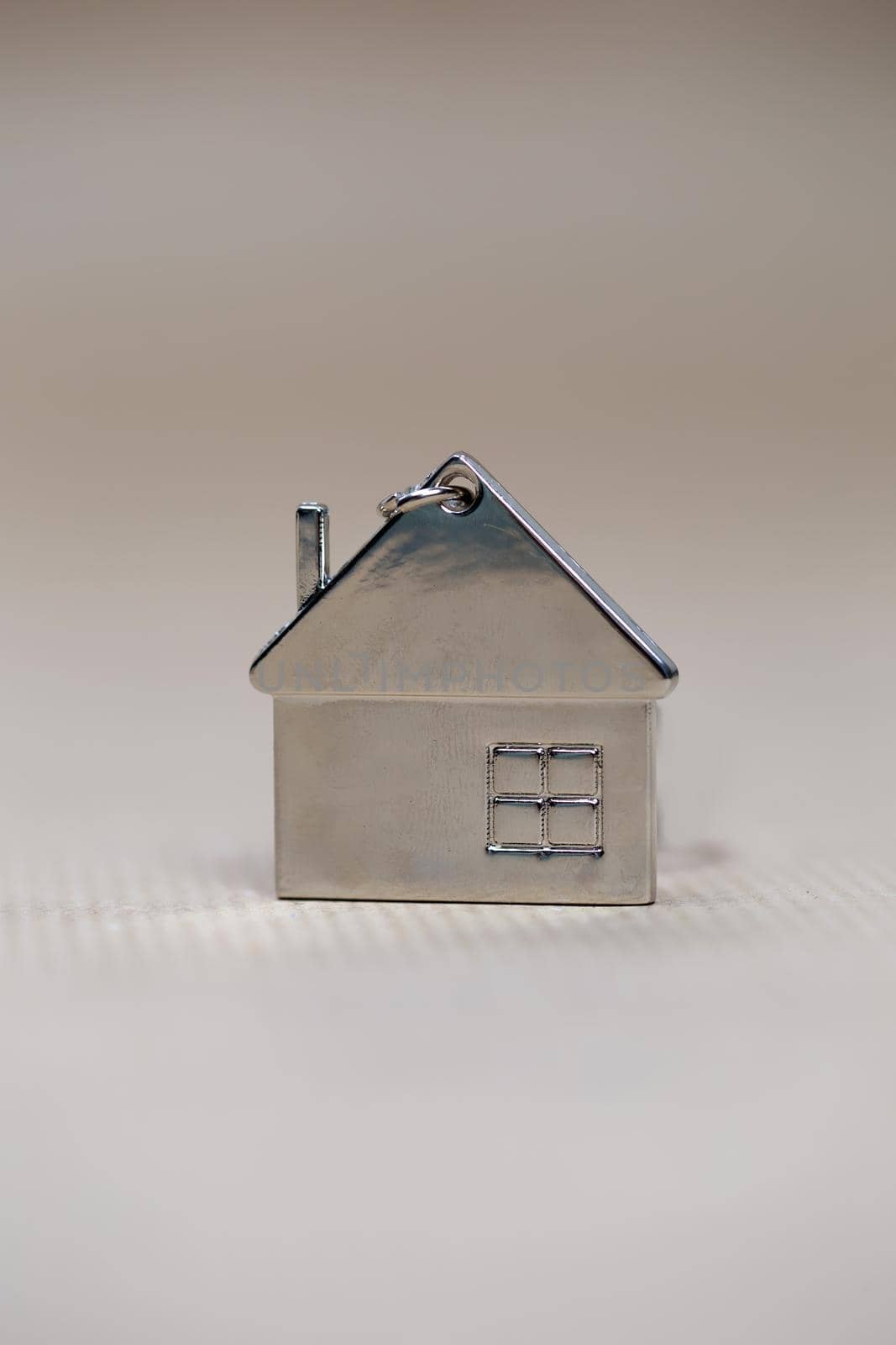 Little miniature house on blurred background, New home, Real Estate, Mortgage loan,architectural concept with Copy space space fot text