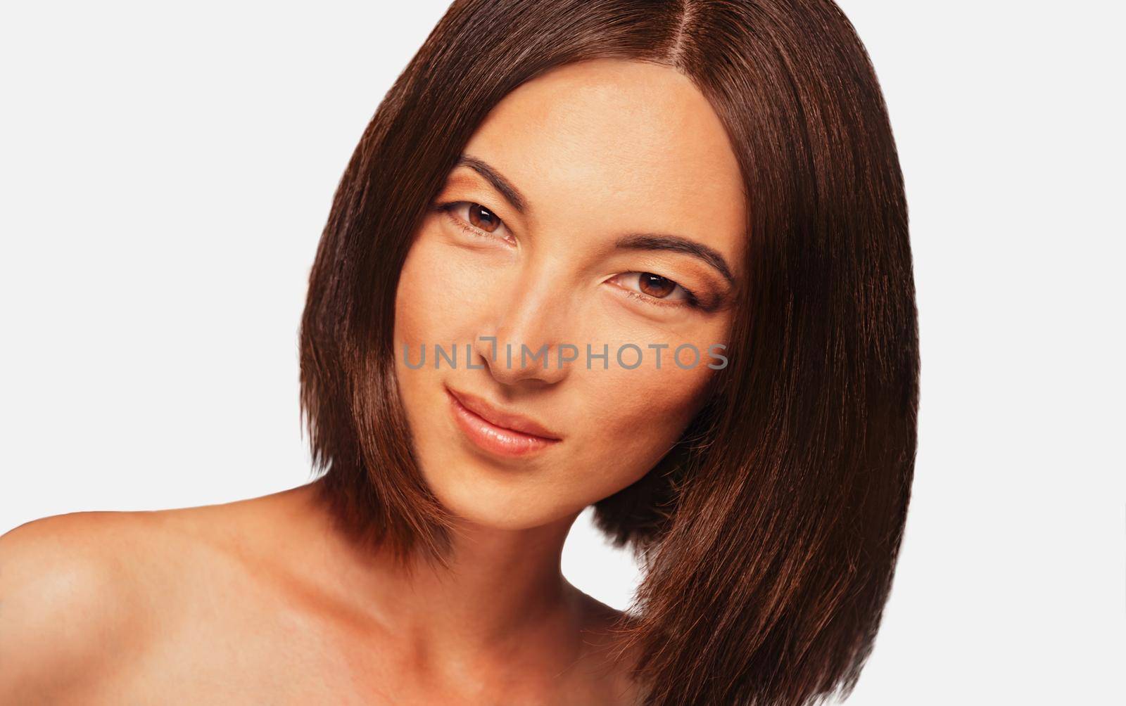 Portrait of beautiful smiling mixed race woman on white background