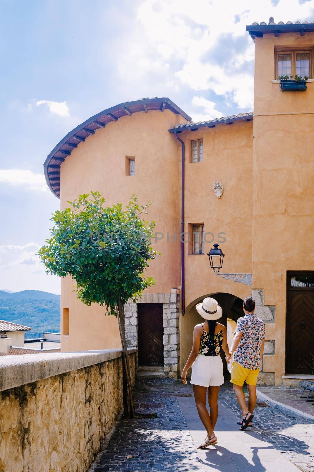 Overview of Fiuggi in Italy, Scenic sight in Fiuggi, Province of Frosinone, Lazio, central Italy. Europe, a couple walking on the colorful streets of Fiuggi. 