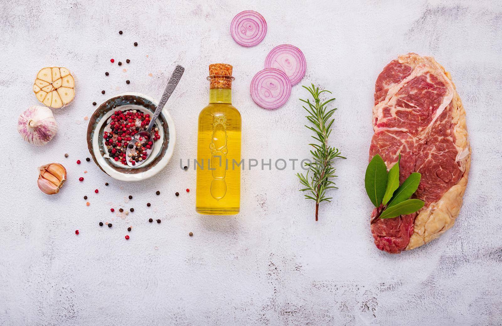 


Raw Striplion Steak set up on white concrete background. Flat Lay of fresh raw beef steak with rosemary and spice on white shabby concrete background top view.
 by kerdkanno