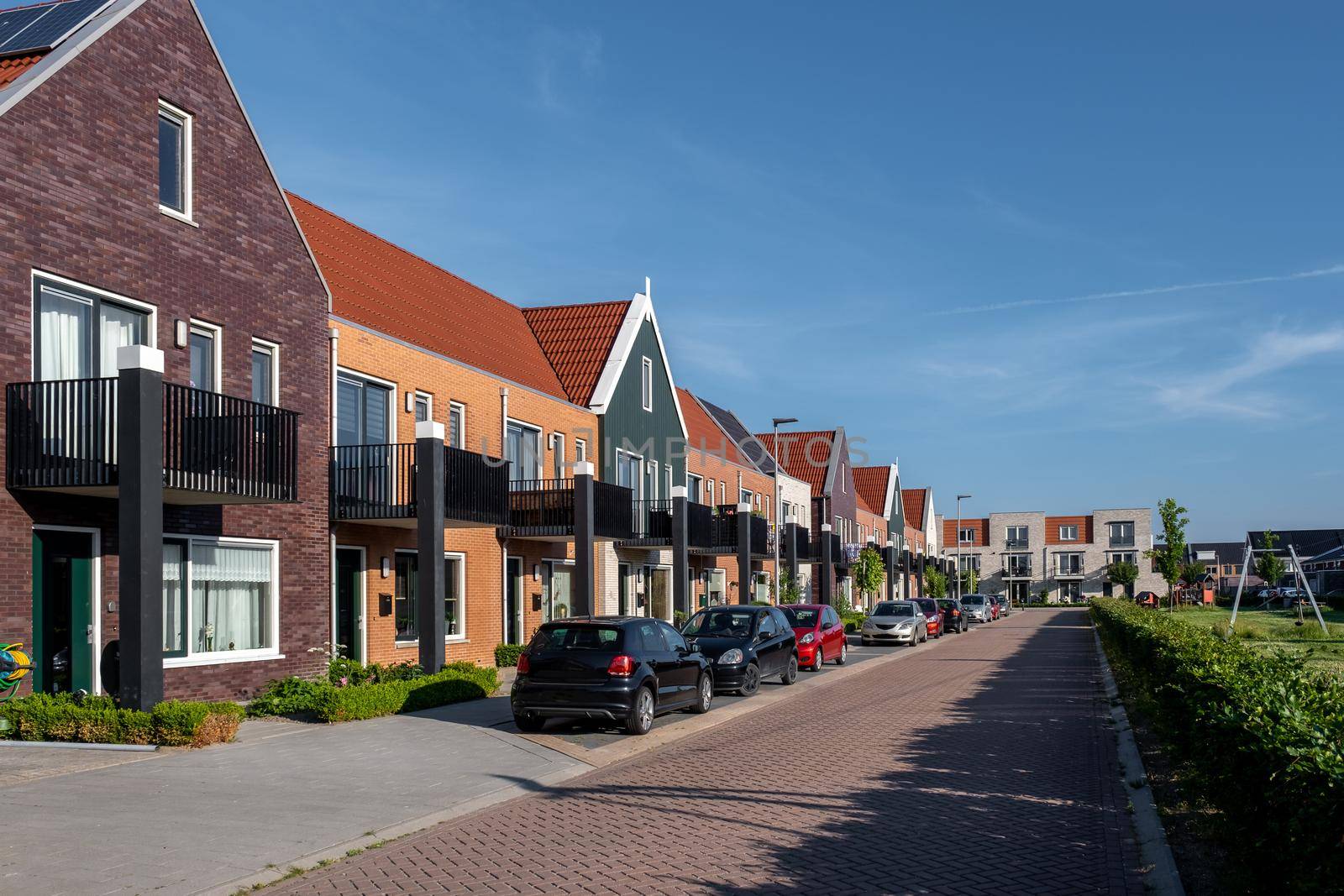 Dutch Suburban area with modern family houses,newly build modern family homes in the Netherlands,dutch family house, appartment house by fokkebok