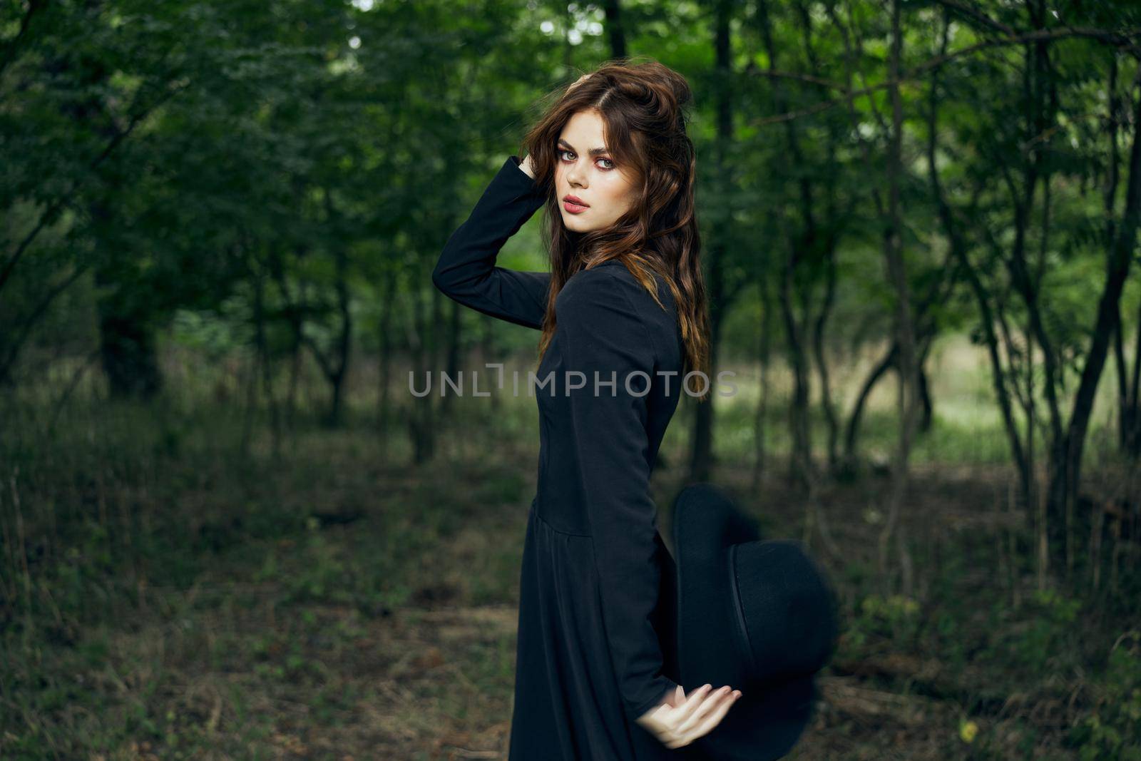 woman in black dress in the forest Halloween Witch costume by Vichizh