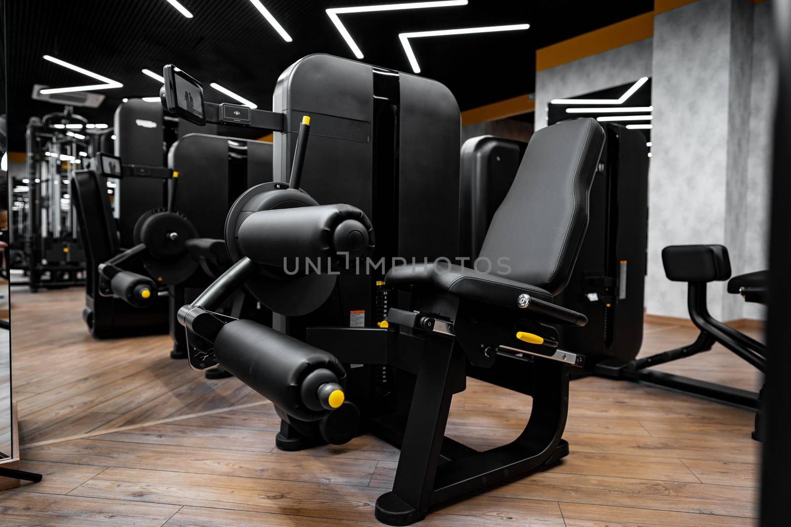 Modern gym interior with new fitness equipment, no people