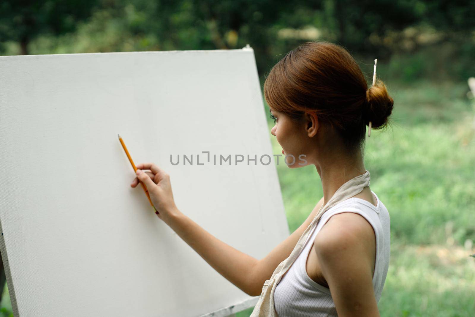 woman outdoors painting a picture creative art landscape by Vichizh