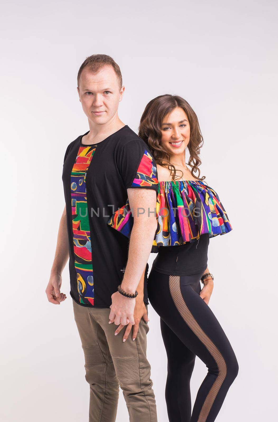 Beauty couple dancing social dance. Kizomba or bachata or semba or taraxia , on white background.