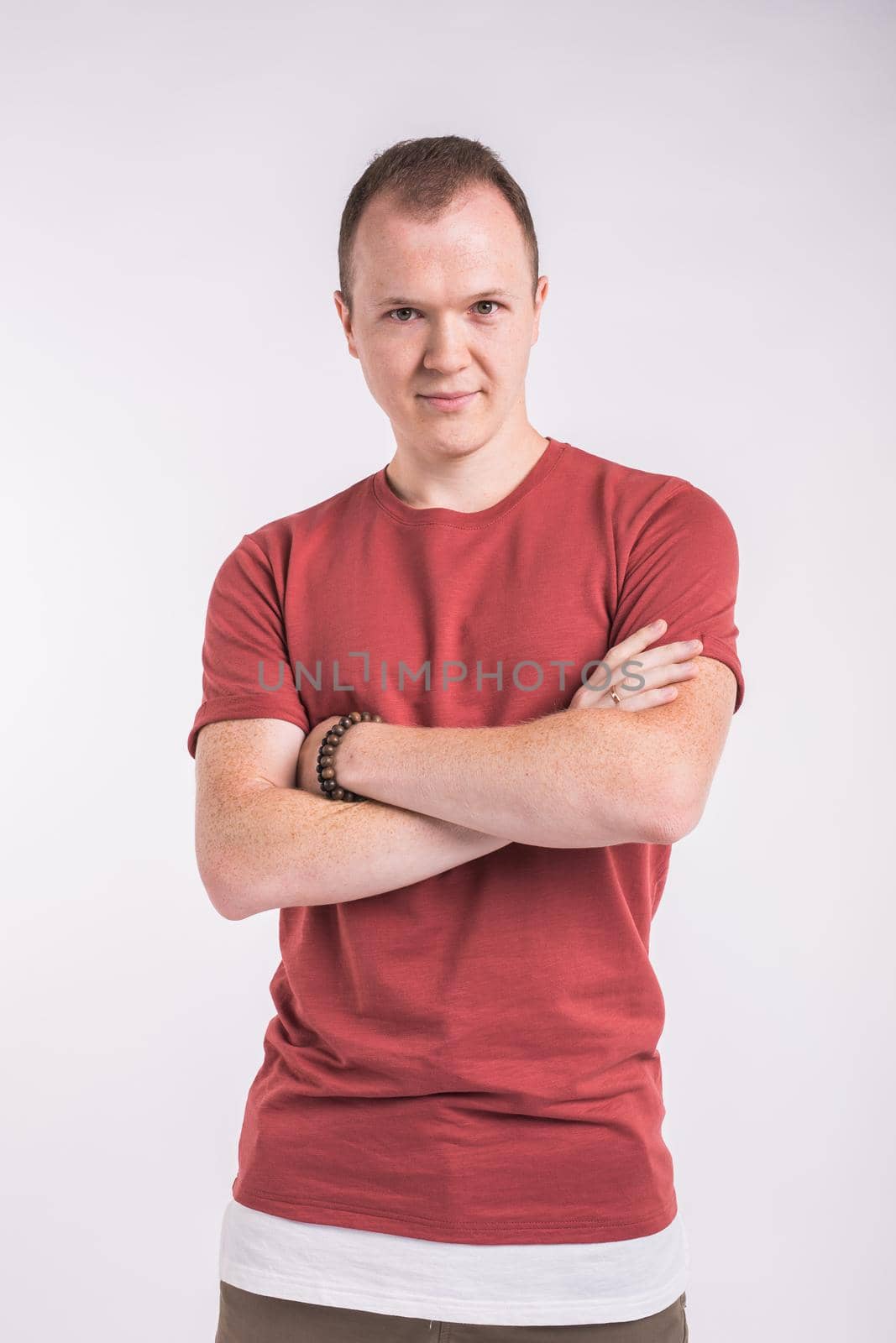 Elegant young handsome man. Studio fashion portrait. White background. by Satura86