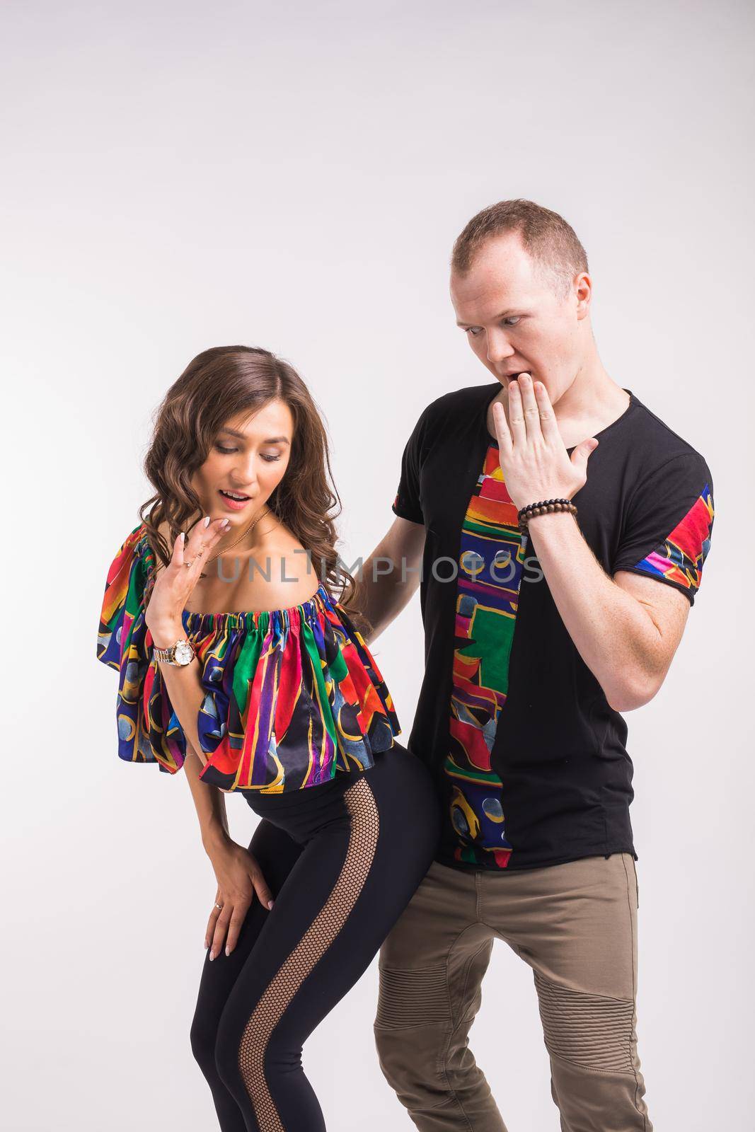 Beauty couple dancing social dance. Kizomba or bachata or semba or taraxia , on white background.