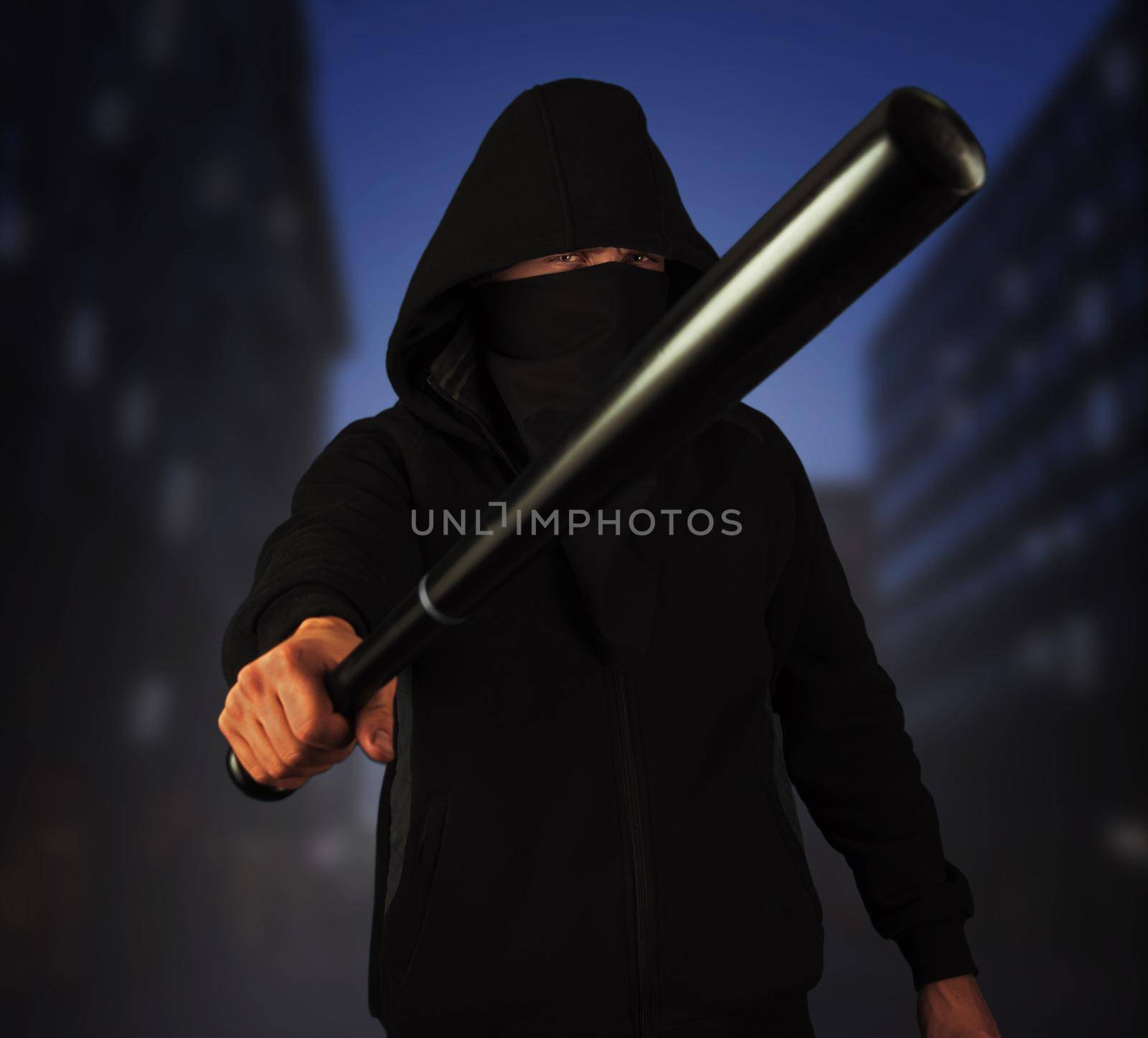 Dangerous man in the mask with baseball bat ready for fight in the night city