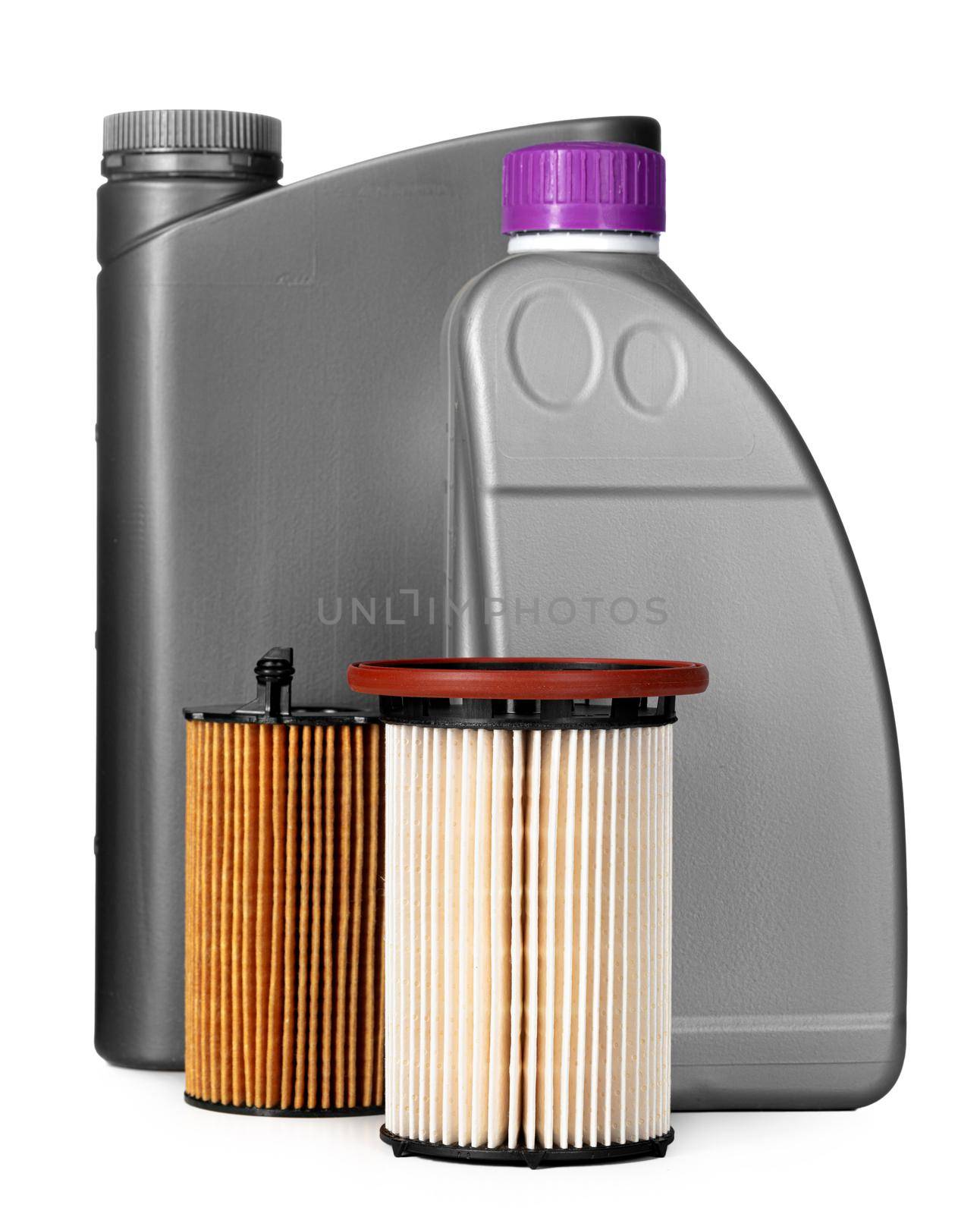 Car filters and motor oil can isolated on white, close up.