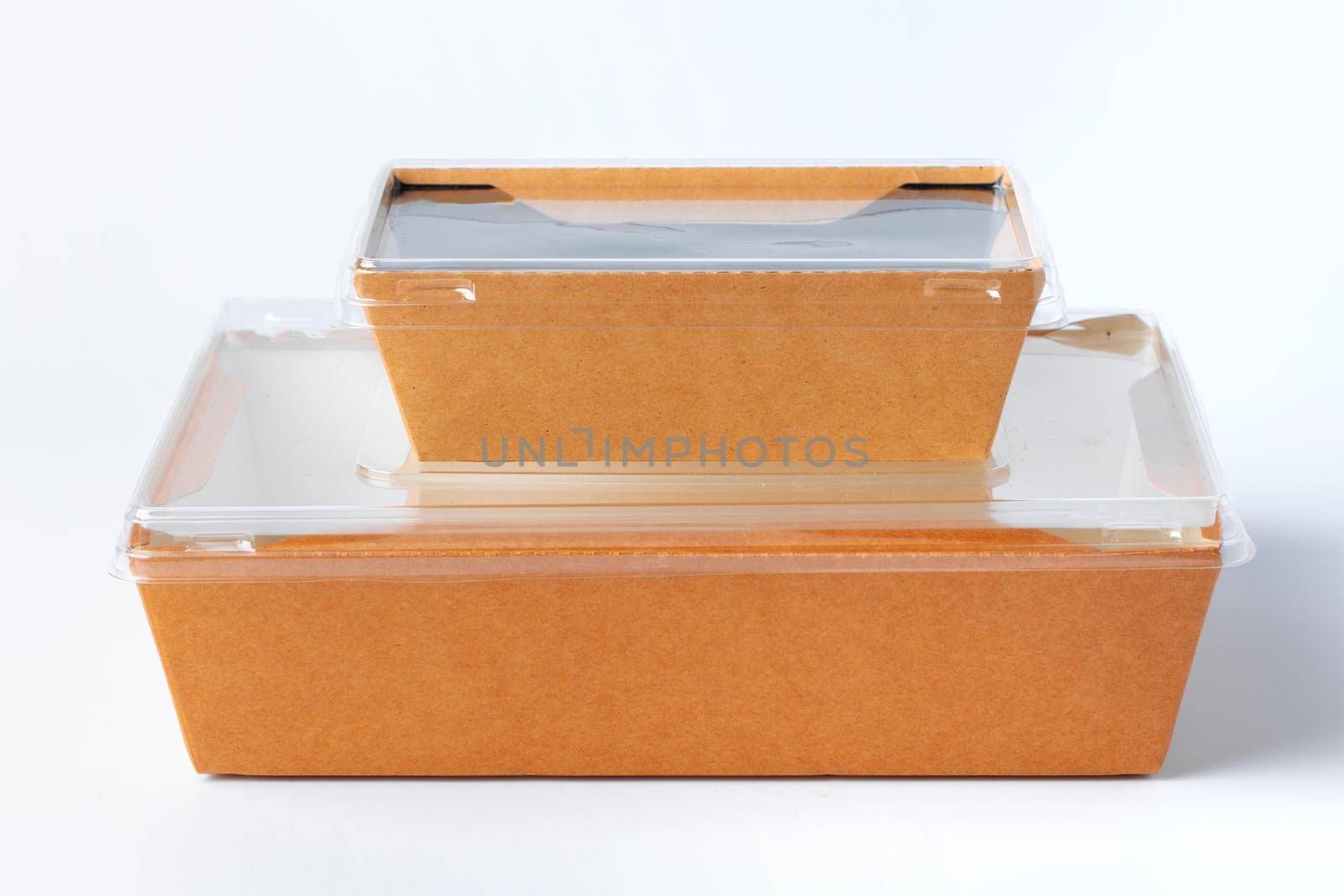 Cardboard brown food box pack isolated on white background close up