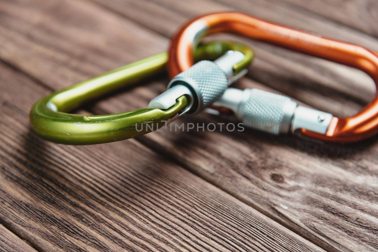 Two carbines on wooden background, close-up