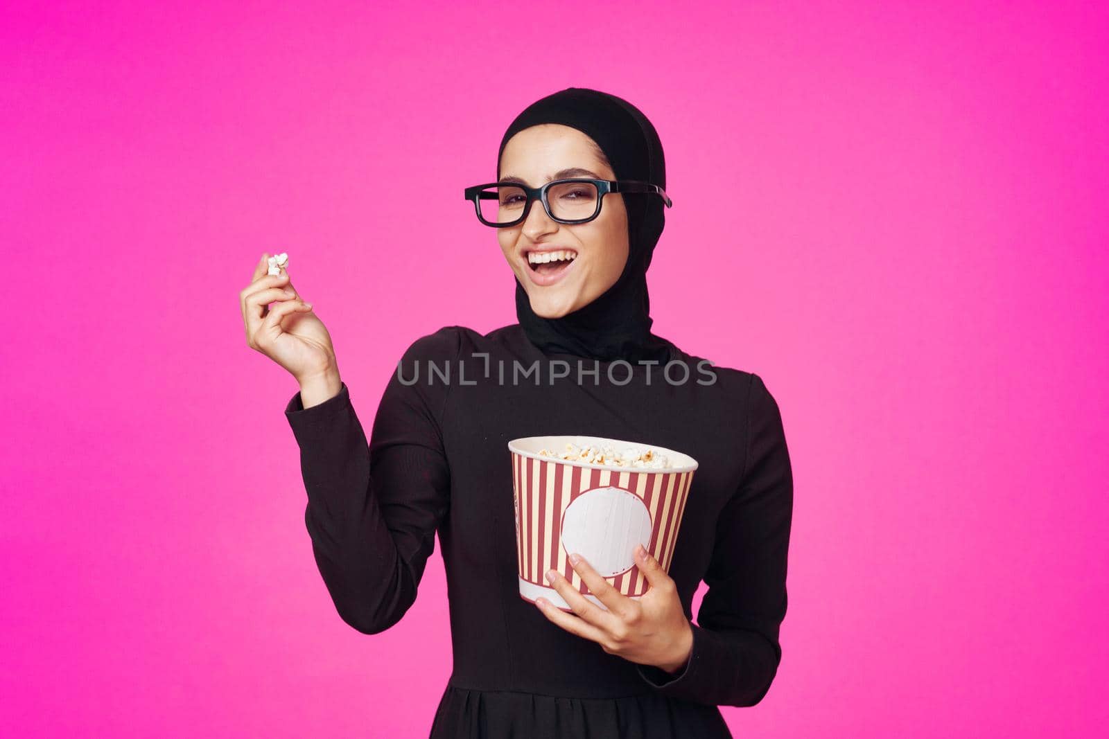 cheerful woman attractive look popcorn glasses movie watching isolated background. High quality photo