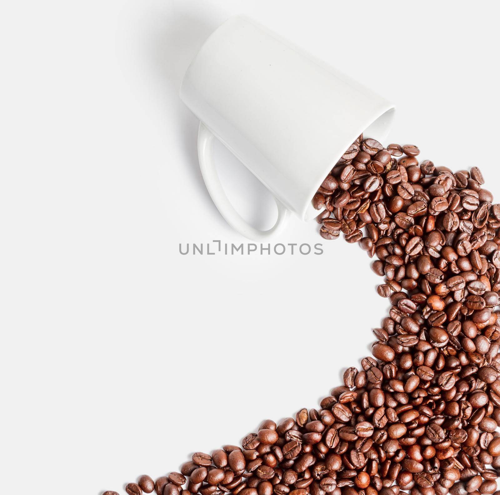 Coffee beans in the shape of path from cup, top view