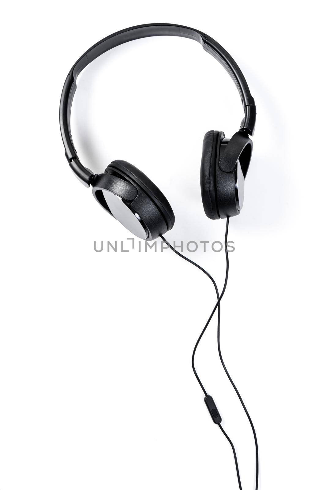 wired black headphone isolated over white background