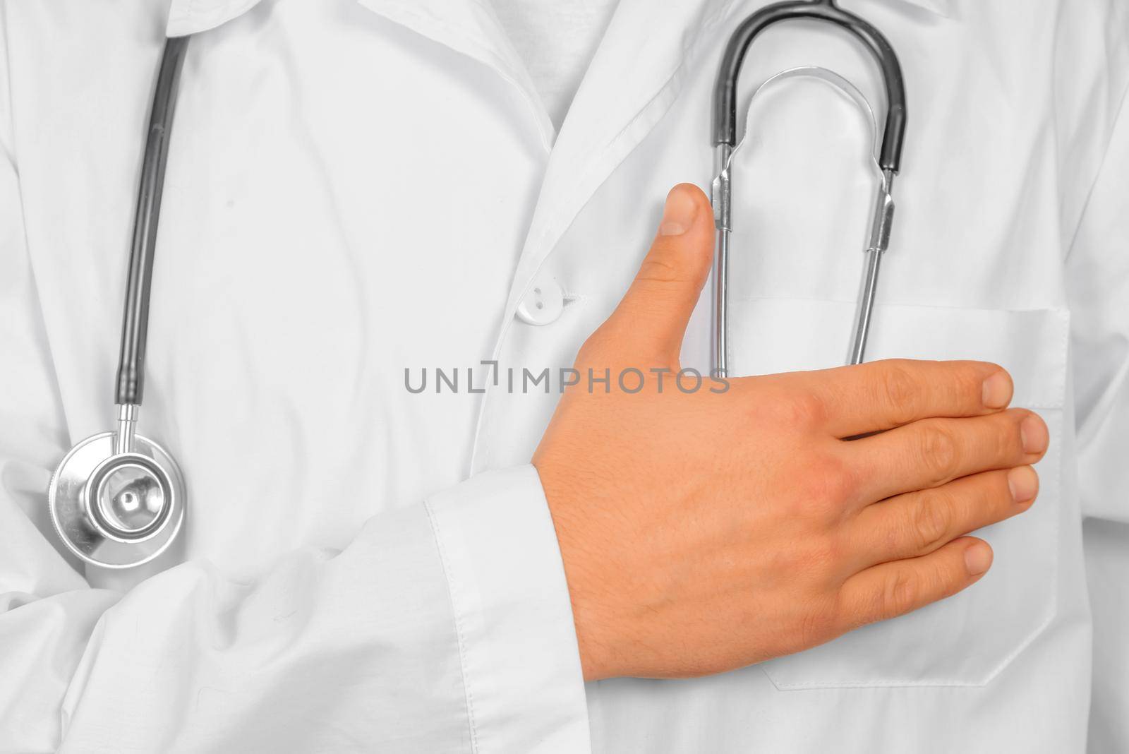 Doctor is stroking his pocket with money, concept of bribery