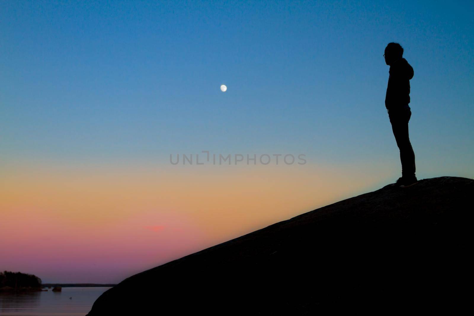 Woman enjoying the silence during a wonderful sunset