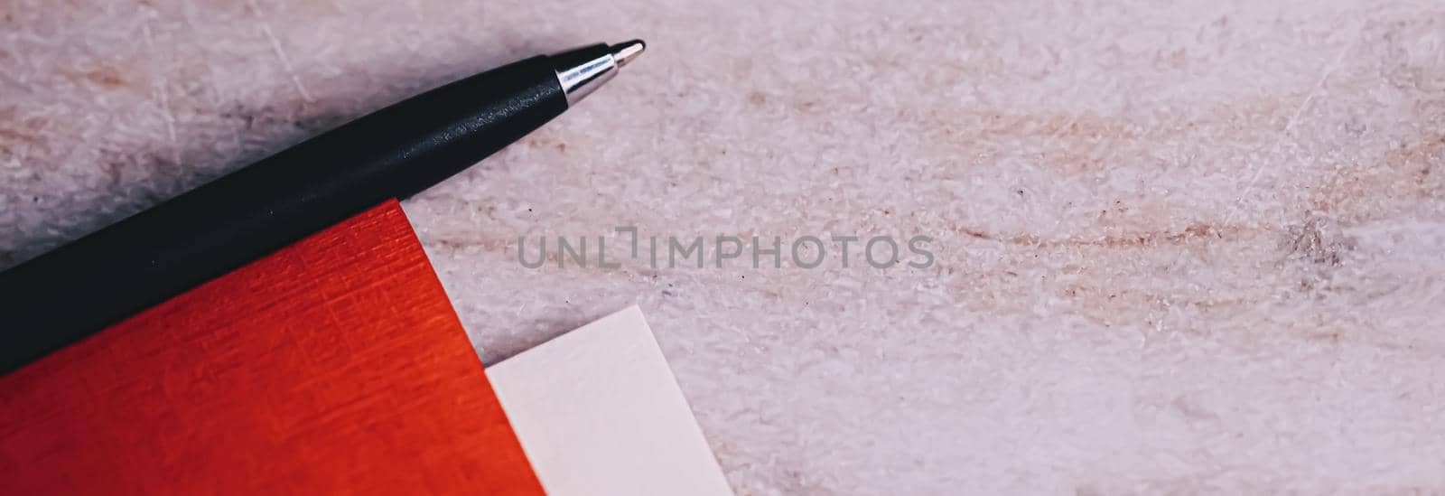 Pen and papers as office stationery, closeup