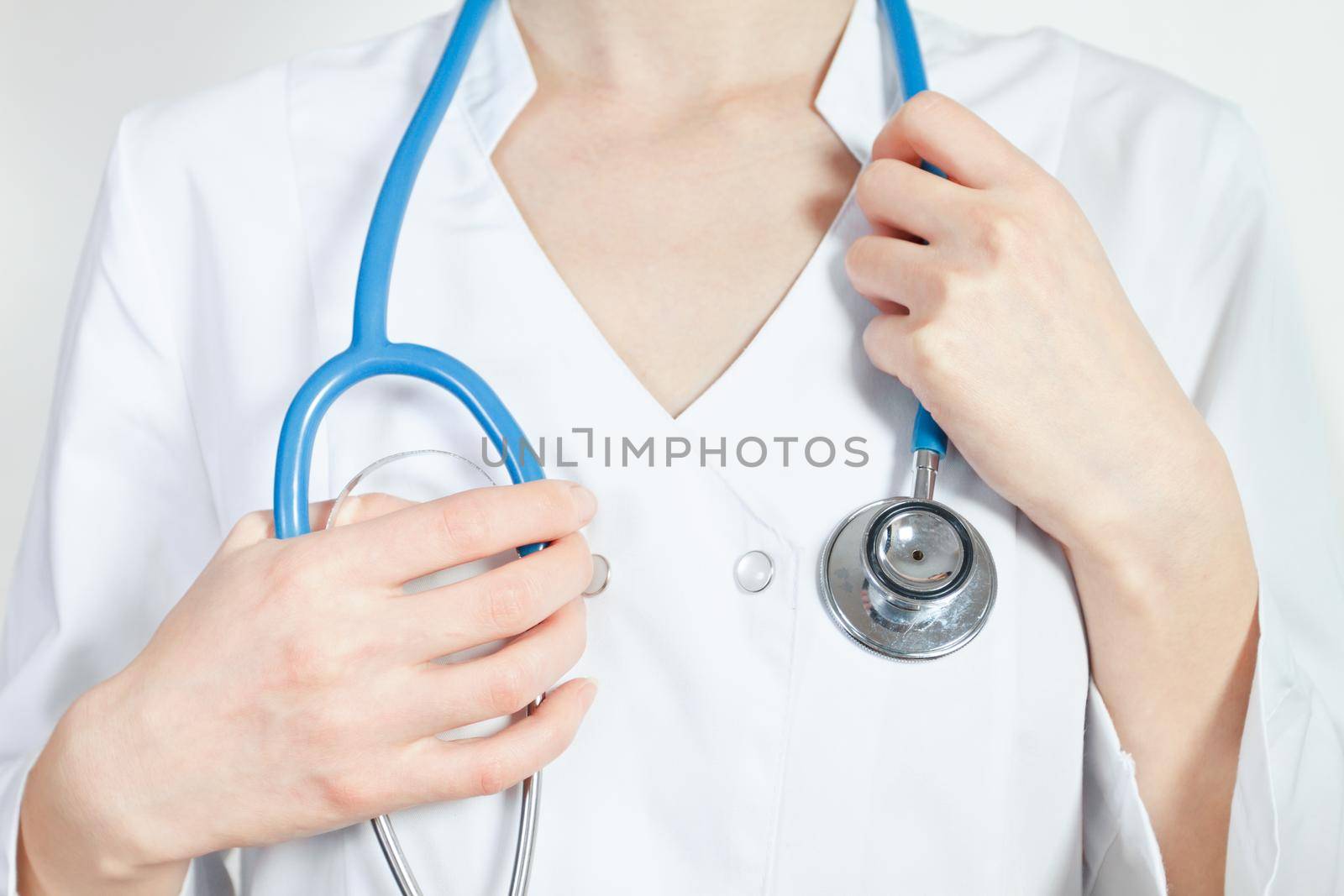 Female doctor hold stethoscope