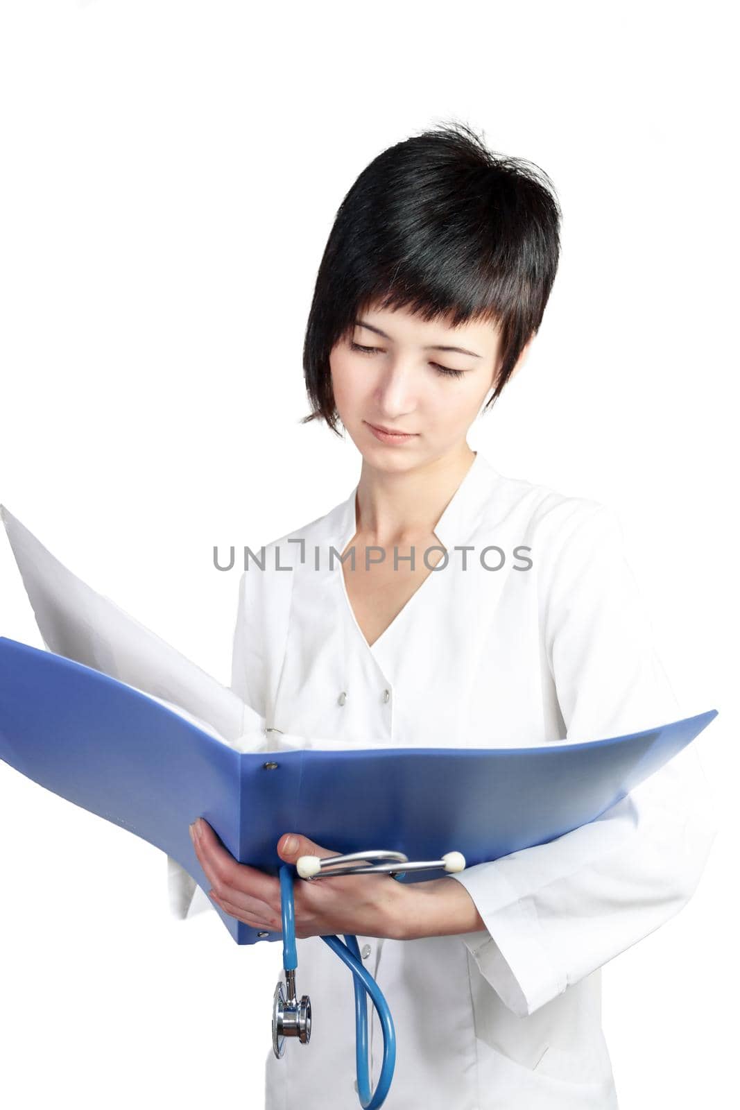 young woman doctor reads papers